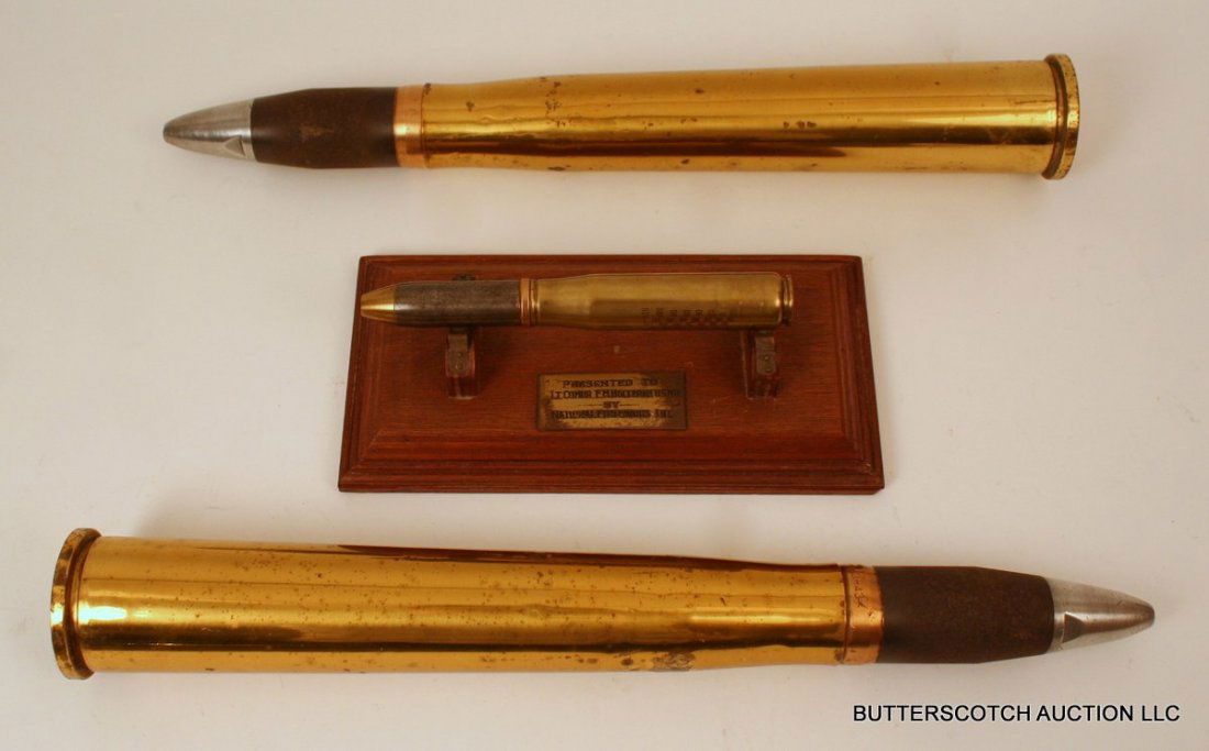 611) THREE LARGE ARTILLERY SHELLS: 611) THREE LARGE ARTILLERY SHELLS, Two (2) 40mm M-25 (18") and One (1) 20mm MK2, with commemorative engraving.