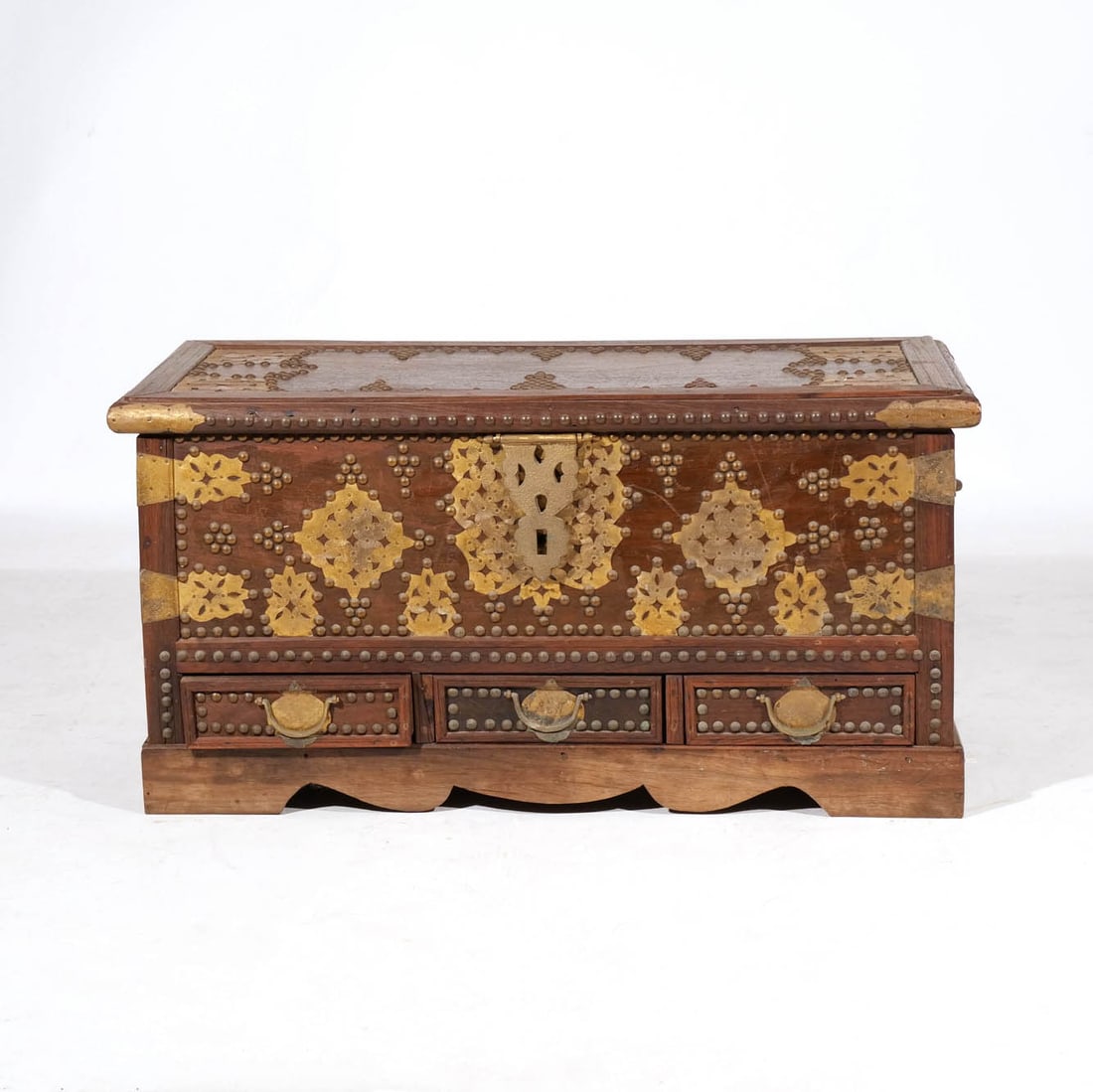 ZANZIBAR STUDDED BRASS & HARDWOOD CHEST: Late 19th / early 20 century h. 17 w. 33 d. 14 in. Provenance: Descent through the family of an avid collector and dentist, Armonk, NY [In Situ Item] This item will not be on display in our salesroom 