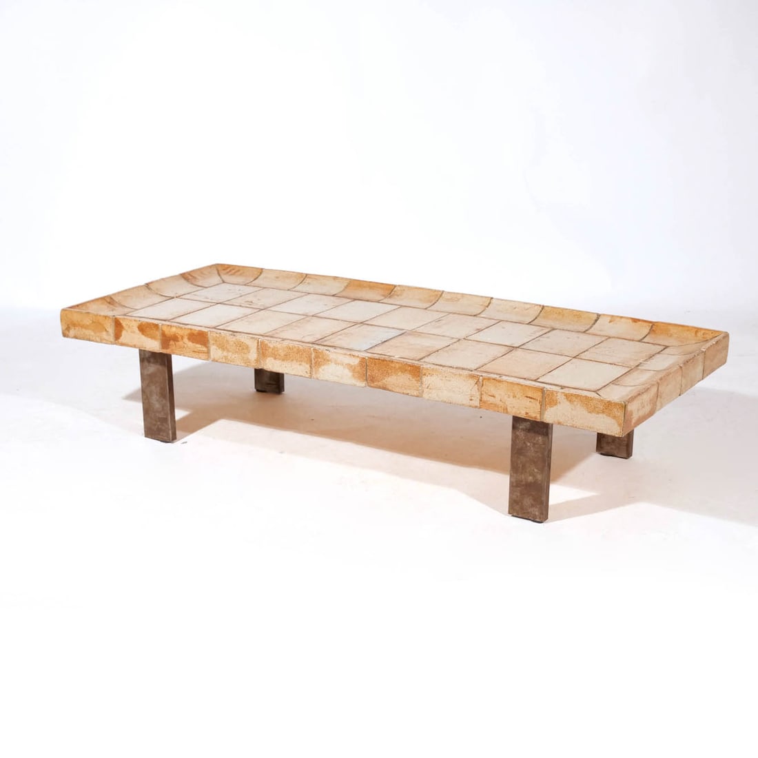 ROGER CAPRON (1922-06) GLAZED STONEWARE LOW TABLE: Label on verso with maker's tag and number 30420H, signed 'R. Capron' in corner h. 11 w. 48 d. 20 in. Provenance: Private Collection, New York, N.Y.