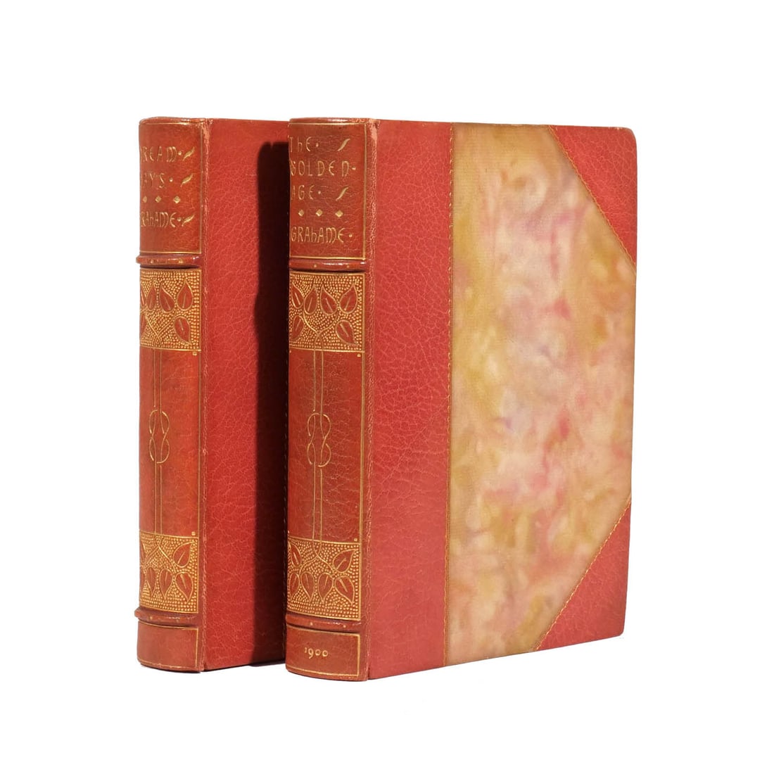 (2vol) [FINE BINDINGS] GRAHAME, KENNETH: The Golden Age (I), and its companion volume Dream Days (II), Profusely Illustrated by Maxfield Parrish. London and New York: John Lane, 1900-1904. Small 8vo, attractively bound in red ? leather over