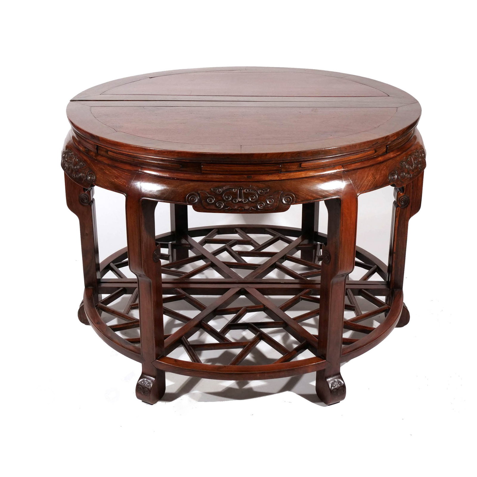 (2pc) CHINESE HARDWOOD TWO-PIECE CENTER TABLE: 19th or 20th century, functioning as either a center table or two demi-lune console tables, with carved aprons and 'cracked ice' stretchers h. 24 w. 48 in. Provenance: Scarsdale, NY estate
