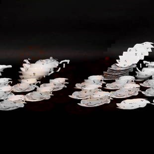 (37pc) HEREND PORCELAIN FLORAL PATTERN: Including 12 saucers, 11 tea cups, a teapot with a rose finial (6-1/2 x 10-1/2 x 7 in.), a creamer, and 12 bread plates Provenance: Descent through Bedford, N.Y. estate[IN SITU ITEM] This item will no
