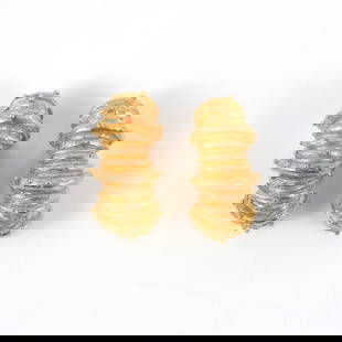 PAIR 18K GOLD CLIP EARRINGS: Stepped segmented convex form, size: 1-1/8 x 3/8 in., total weight 25.1 g, no fineness mark, tested to 18k, marked Pat only Provenance: Descent through Weston, CT. family