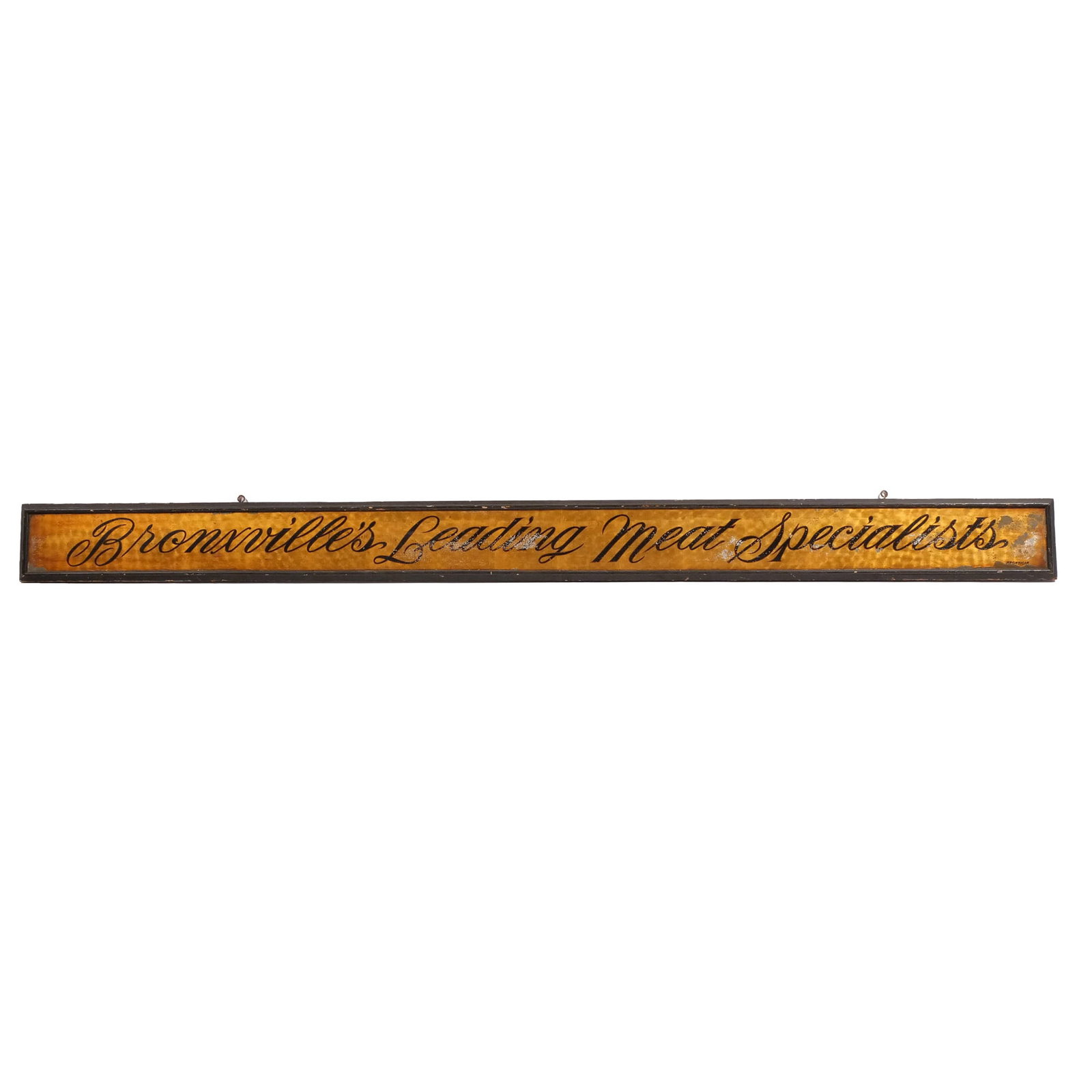 BRONXSVILLE'S LEADING MEAT SPECIALISTS TRADE SIGN: Early 20th century, foil-covered sign with black lettering on a gilt ground, signed 'Krontilik', lower right h. 88-1/2 w. 7-1/2 in. Provenance: Descent through the family of an avid collector and dent