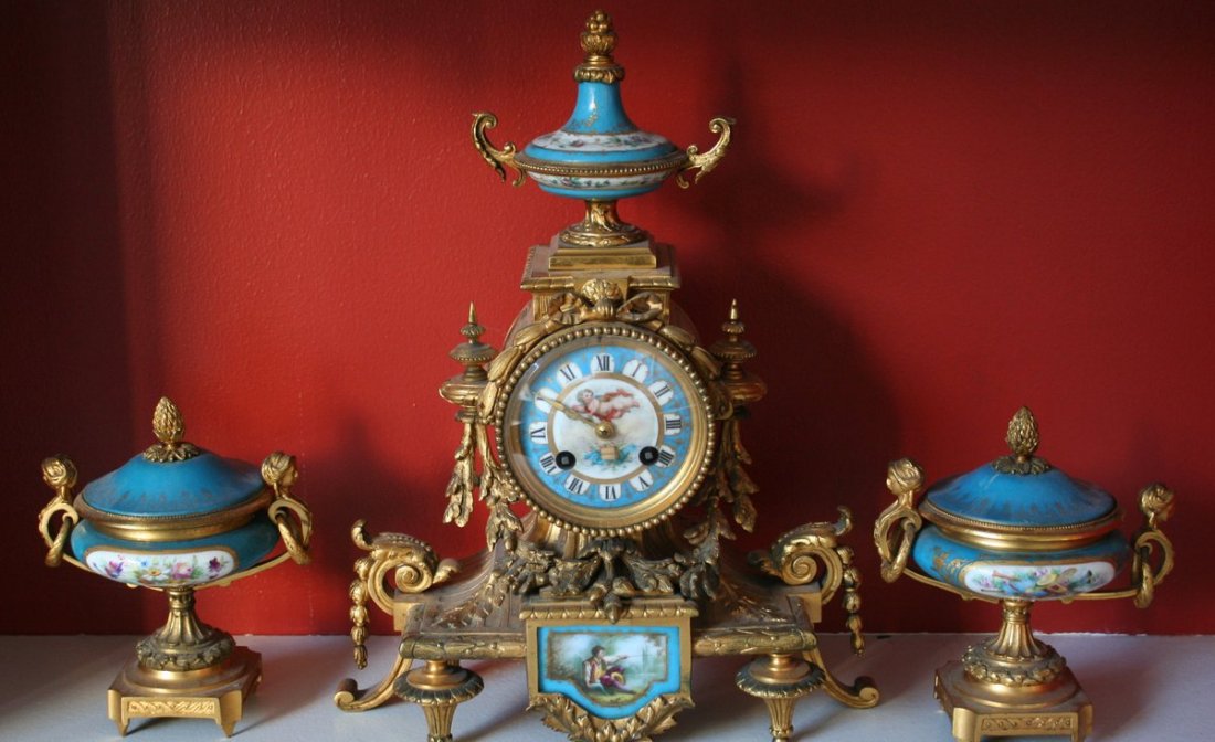 132) L 19. C. SEVRES 3 PIECE GARNITURE SET W/: ORMOLU MOUNTS,MOVEMENT MKD. G. PHILIPPS, PALAIS ROYAL, CONSISTING OF 2 JARS & CLOCK, CLOCK H.13 1/4", W.11", D.4" W/KEYS; JARS H.6 1/2" X 6", LID OF ONE JAR CRACKED