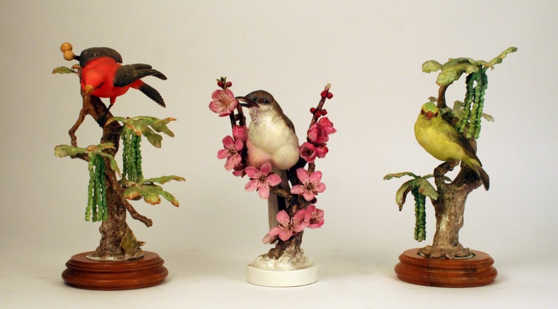 222) 3 DOROTHY DOUGHTY ROYAL WORCESTER BISQUE BIRDS,: including scarlet tanager (male), scarlet tanager (female), and mocking bird, Height range: 12" - 10 1/2", with original boxes
