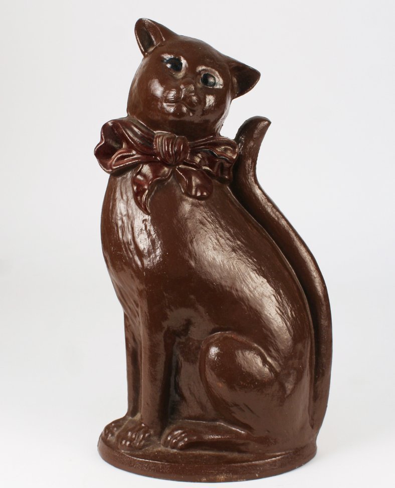 449) CAST IRON PAINTED CAT-FORM DOORSTOP: from the model by Harry Banks (British), H: 14 1/2"