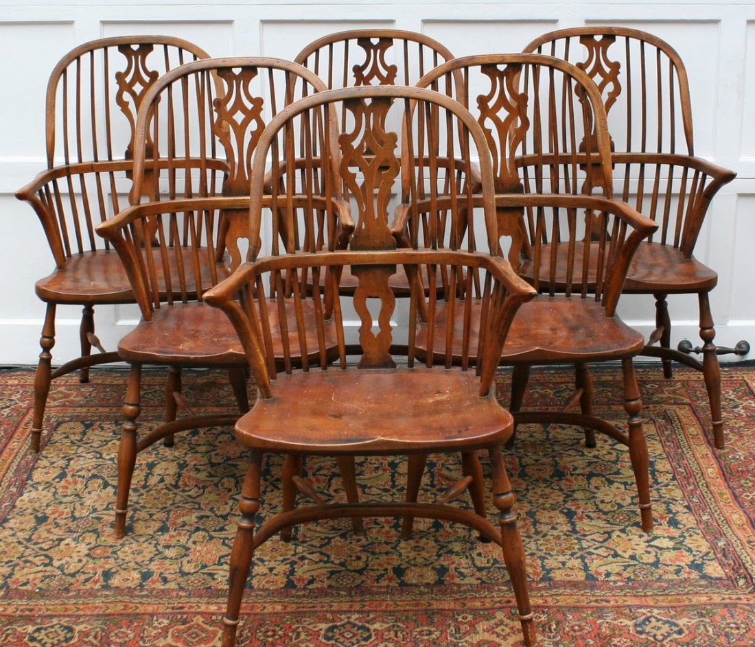 531) 6 ENGLISH WINDSOR ARMCHAIRS, E 20th Century: CONTINUOUS ARM W/BOW STRETCHERS, OVERALL H. 40 1/2", SEAT H. 18", WIDTH 23"; MARKED MADE IN ENGLAND
