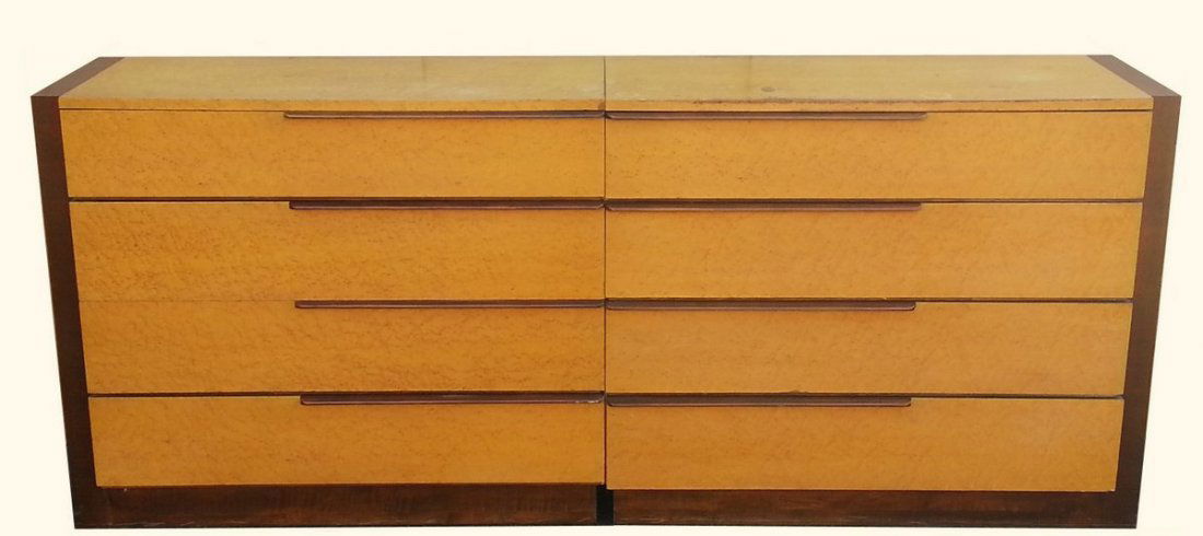 621) GILBERT ROHDE FOR HERMAN MILLER PAIR: MATCHED CHESTS with 4 drawers, each with horizontal off-center pulls and bird's-eye maple veneer on the drawer fronts and top, on plinth base, foil label: "Herman Miller Furniture Co./Zeeland Michigan
