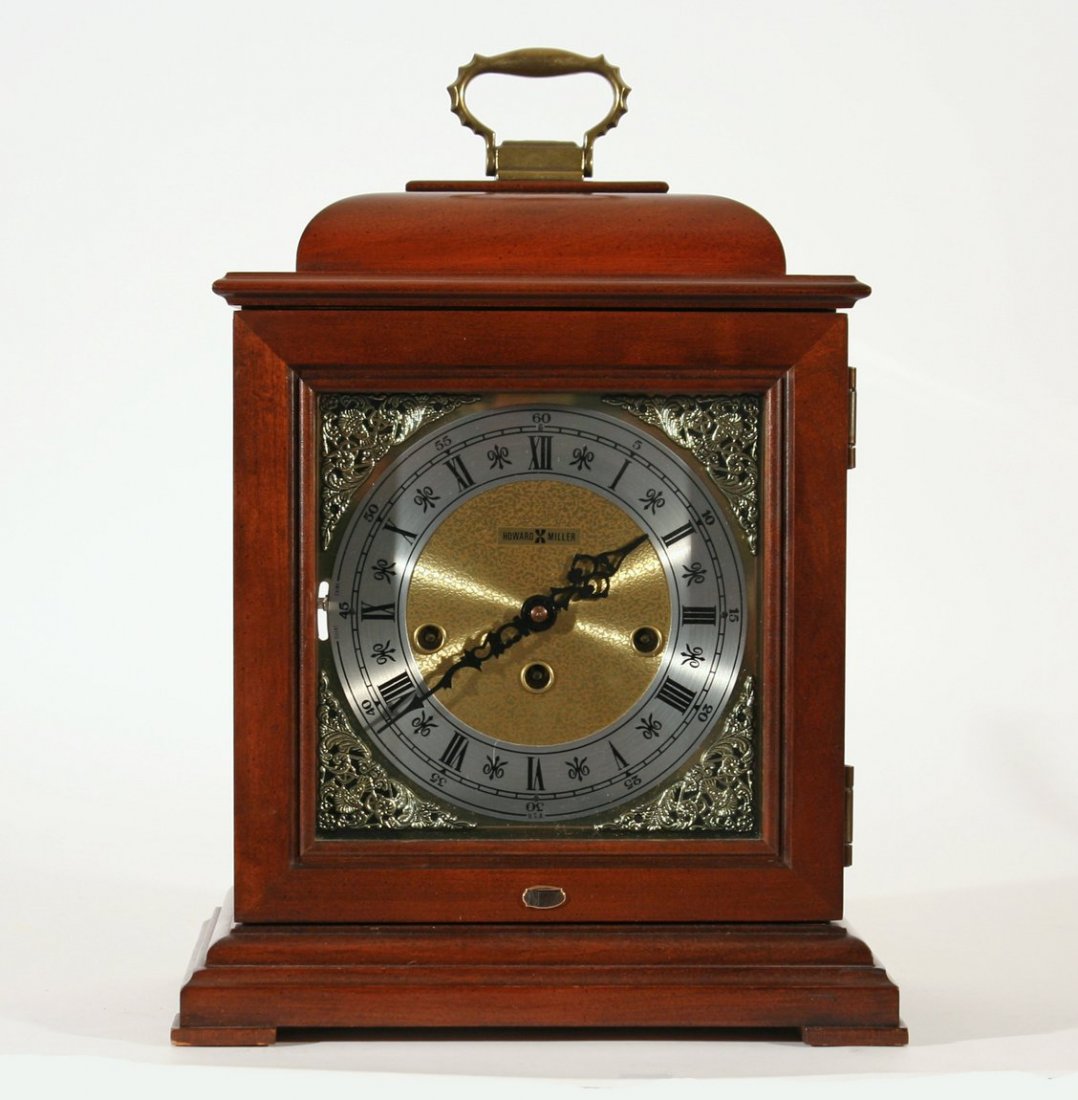 631) HOWARD MILLER BRACKET CLOCK,: Height over handle: 15" W: 11" D: 7"