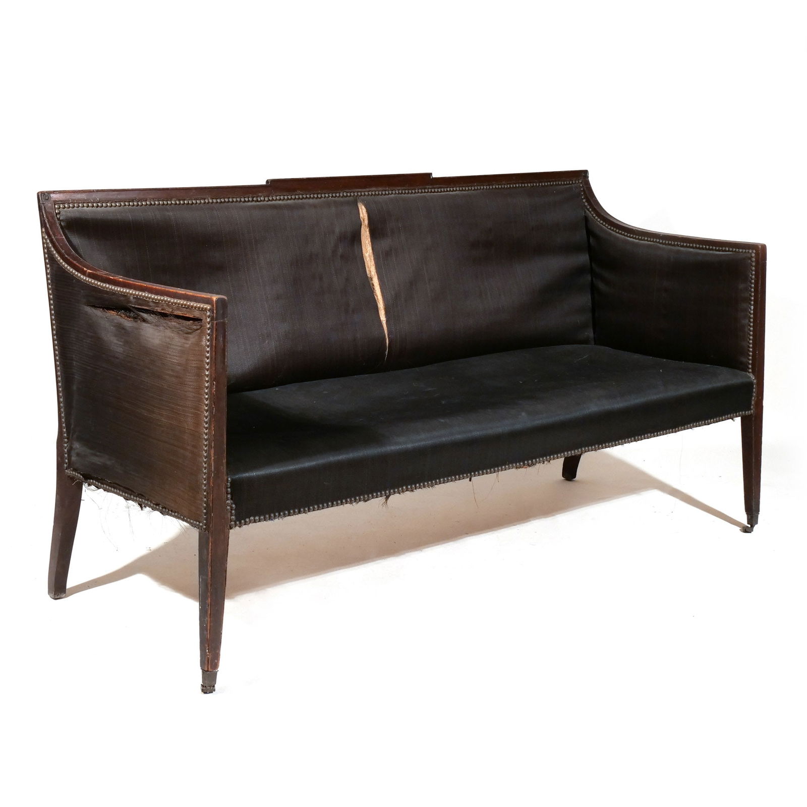 SOUTHERN HEPPLEWHITE SOFA OF SMALL SIZE: C. 1800, having step down crest rail w/rosettes at corners, continuing to down swept armrests. old horsehair fabric and brass tacks, square tapering legs on castersProvenance by repute F. Parke Curtis