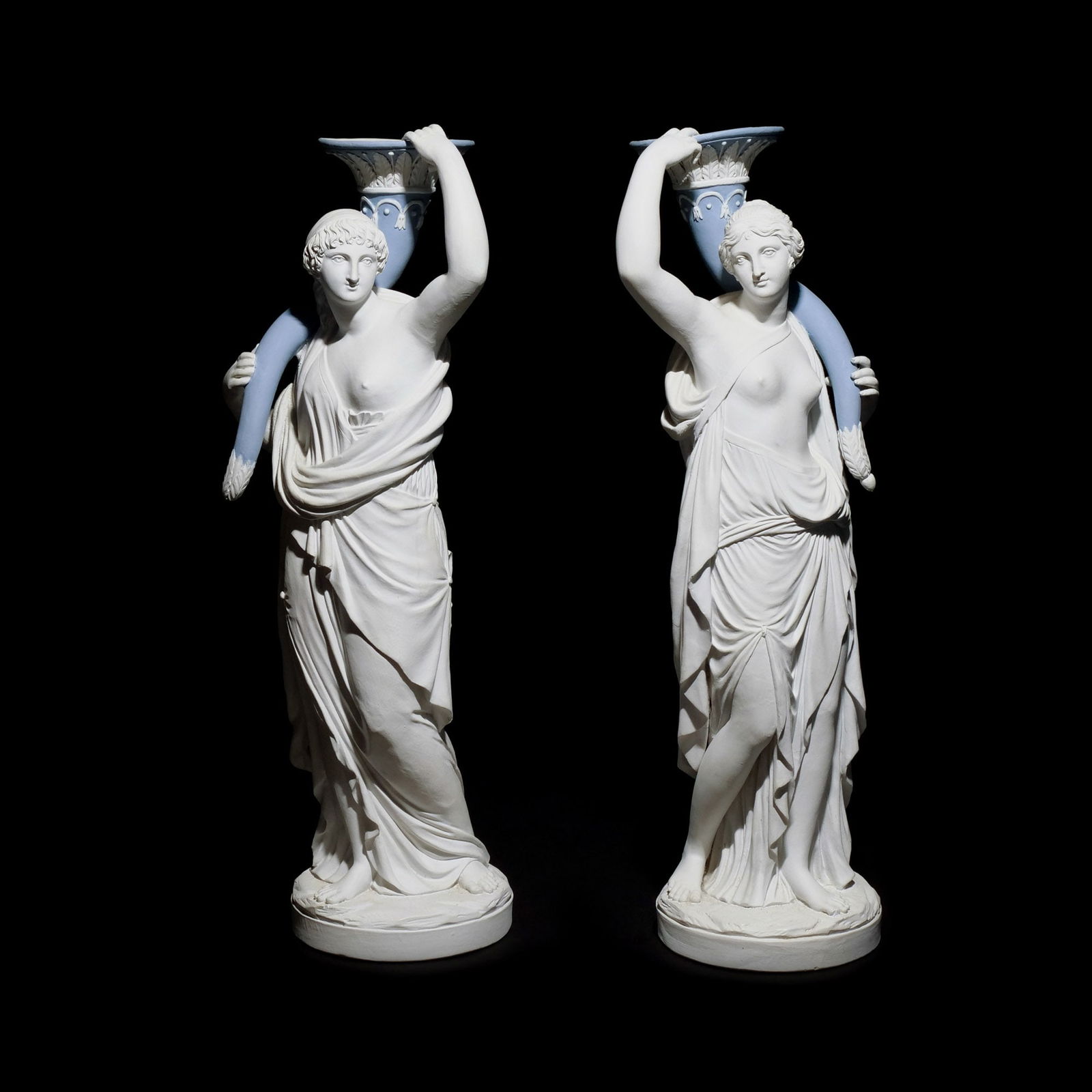 PAIR CLASSICAL PARIAN / JASPERWARE CANDLESTICKS: Classical Female Figures Holding Cornucopia, marked: Nast h. 15-3/4 w. 5-1/2 in. Provenance: Descent through the consignor's family, Pleasantville, NY