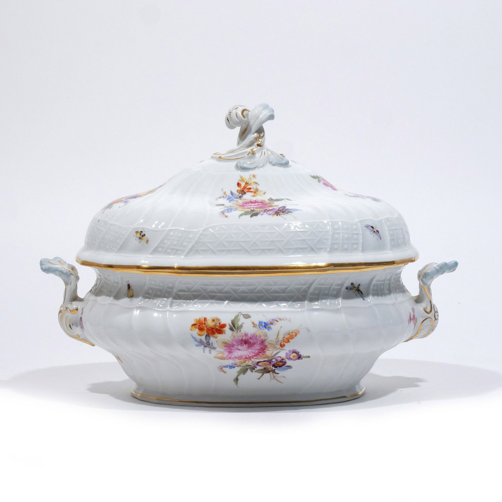 MEISSEN PORCELAIN TUREEN: 20th century, with double acanthus handles and acanthus finial, painted with floral designs, blue crossed swords mark h. 10-1/2 w. 14 d. 9-1/4 in. Provenance: Descent through Waccabuc estate [In Situ
