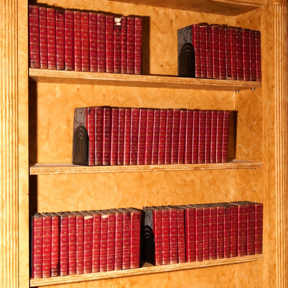 (73vol) VOLTAIRE, FRANCOIS-MARIE AROUET de: Oeuvres Completes de Voltaire. Nouvelle Edition revue par M. Leon Thiesse. Paris: Baudouin, 1839. 8vo, half red leather over marbled boards h. 8-3/4 in. Provenance: Descended through a noted Guard Hil