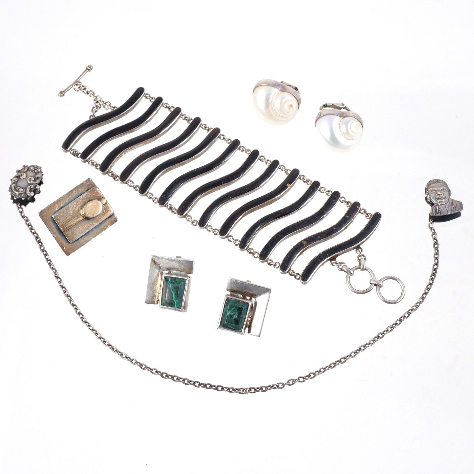 (8pc) MISC. SILVER JEWELRY: Including a pair of malachite ear clips, pair of shell ear clips, black enamel bracelet, portrait sweater clip, and a single Mexican silver & 18k gold ear clip; 3 ozt weighable Provenance: Descent thr