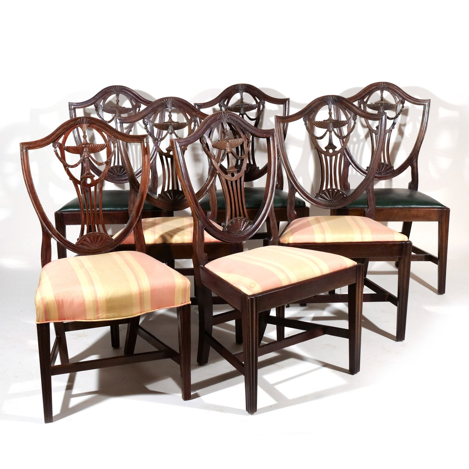 (7pc) SET OF 6 SHIELD BACK KYLIX SIDE CHAIRS: Providence, R.I., C. 1800.; seat height 19 in. plus one similar chair with serpentine seat rail and over upholstery probably not period h. 40 w. 22 d. 19 in. Provenance: A North Salem, NY estate [In S