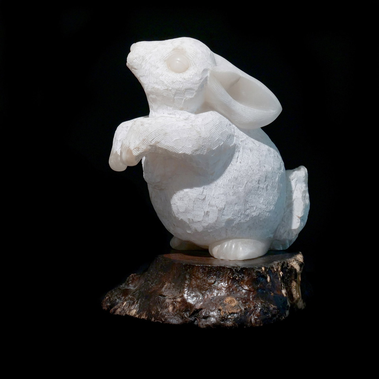 AILENE FIELDS (American, 1948-): Twinkle, 2005 Alabaster h. 23 w. 17-1/2 d. 19 in. Signed, on a swiveling wood base Provenance: Private Collection, Bedford, NY [In Situ Item] This item will not be on display in our saleroom during th
