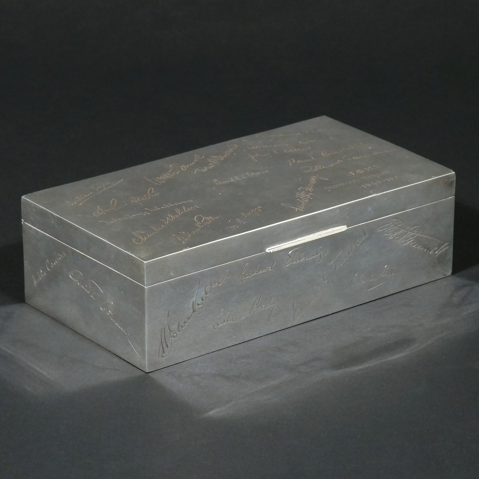 FRENCH SILVER CIGARETTE BOX: With French hallmarks and stamped 'Boin-Taburet A Paris', with numerous engraved signatures and dedication, 20 ozt. h. 2-1/4 w. 7-1/4 d. 4 in. Provenance: Descent through a deceased former U.S.