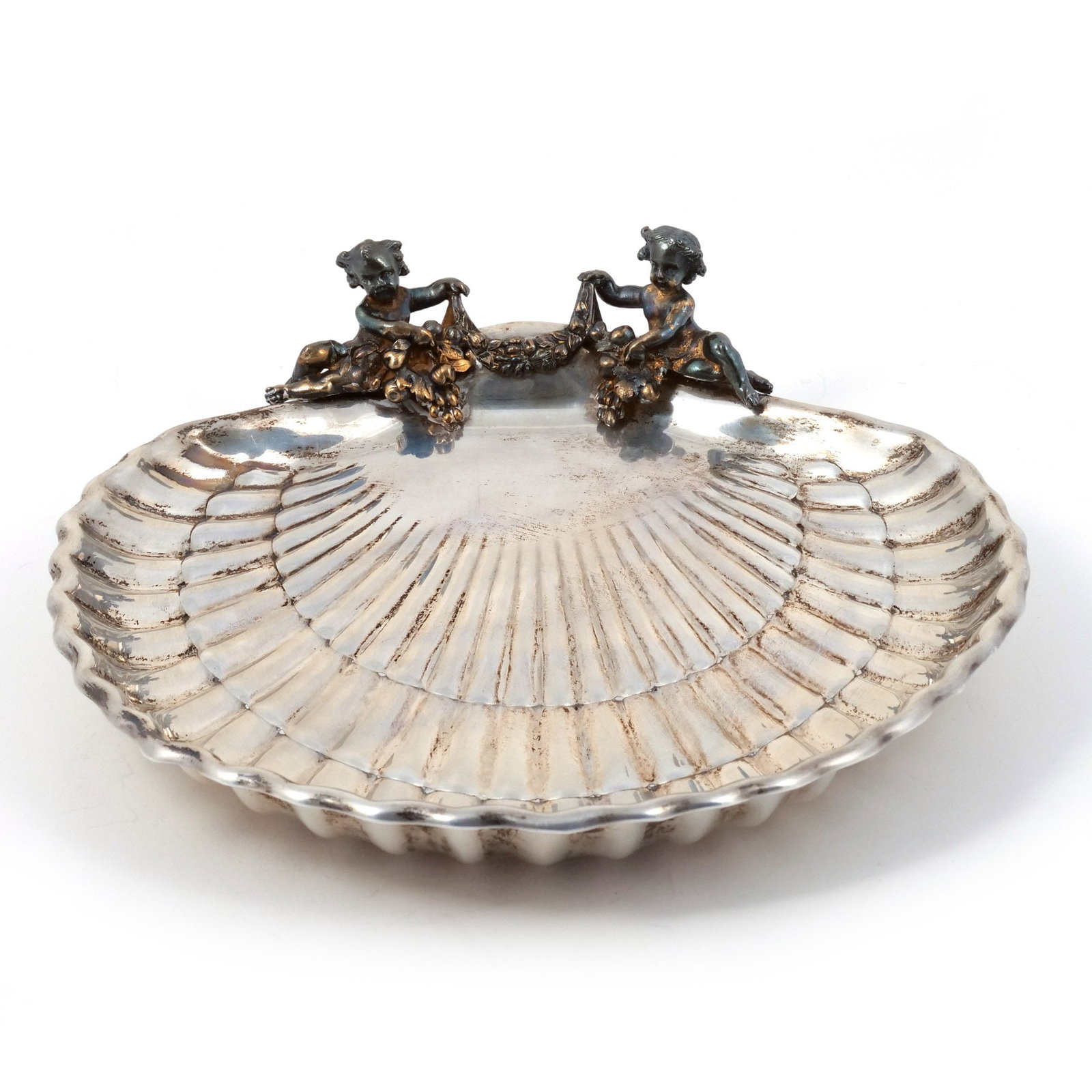 GORHAM STERLING SILVER SHELL-FORM TRAY: Footed and with removable vermeil putti figures, marked 'Gorham / Sterling' with hallmarks, 15 ozt weighable dia. 9-1/2 in. Provenance: Descent through prominent Briarcliff Manor family