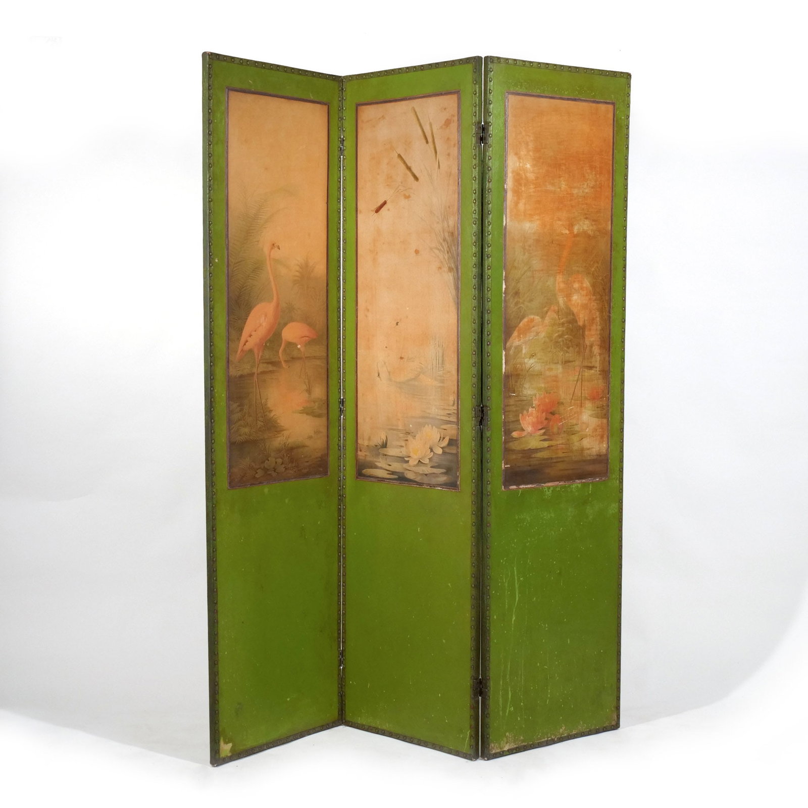 CONTINENTAL THREE PANEL LEATHER FLOOR SCREEN: Early 20th century, with exotic bird printed panels h. 66 w. 52 d. 2 in. Provenance: Descent through a prominent Greenwich, CT family [In Situ Item] This item will not be on display in our saleroom