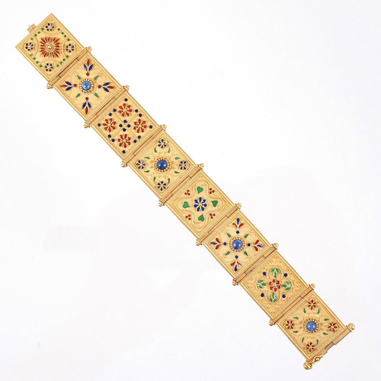 18K ITALIAN GOLD ETRUSCAN REVIVIAL BRACELET: In the style of Giacinto Melillo, composed of 8 plaques decorated with geometric and floral polychrome enamel motifs and cabochon gemstone accents, marked '750' with Italian registration mark, l. 8-1/