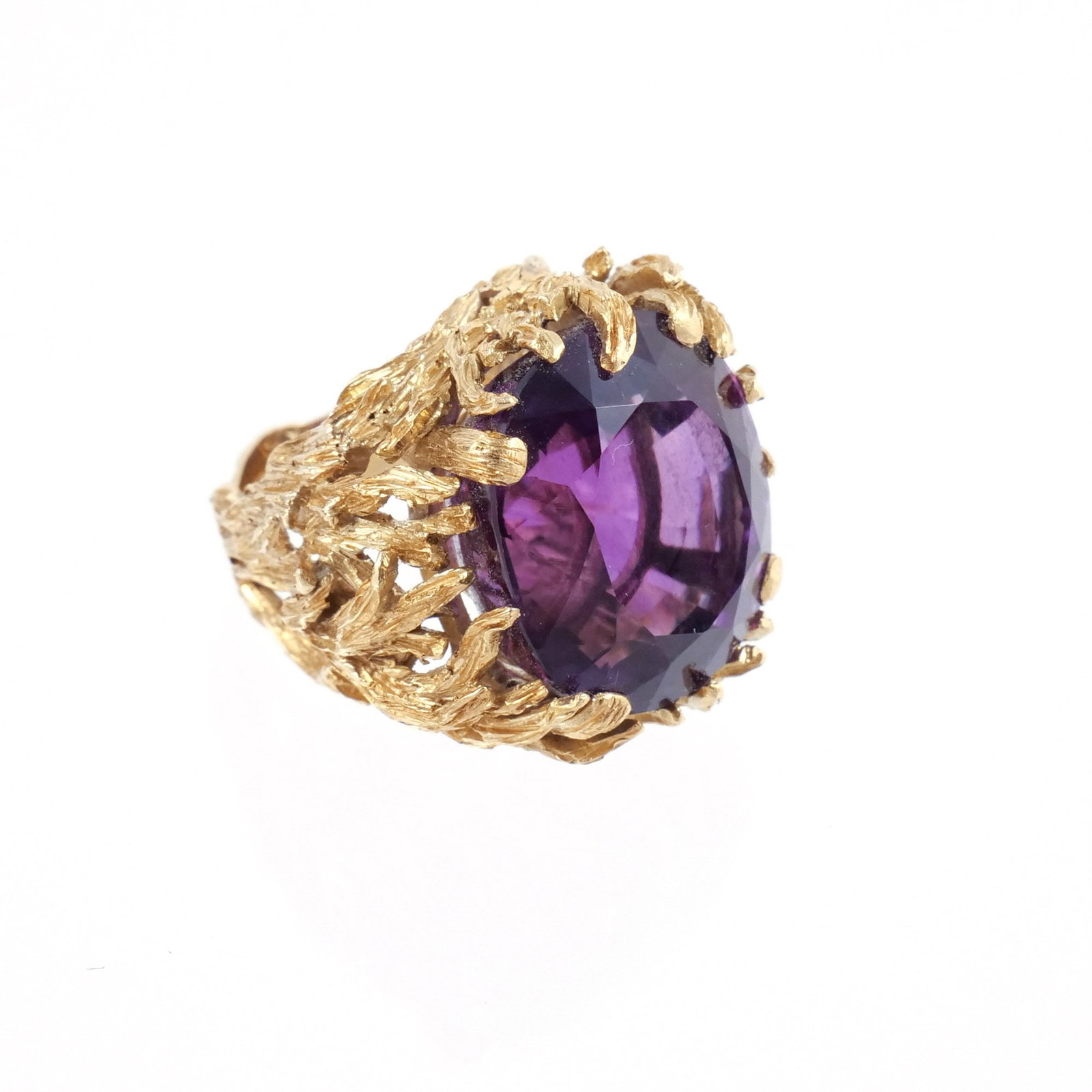 LARGE FACETED AMETHYST and 14K GOLD RING: Of a textured coral / branch design, amethyst approx. 30 ct, unmarked but tests as 14k, size 6-1/4, 35.2 g total weight Provenance: Descended through the family of the current owner, private