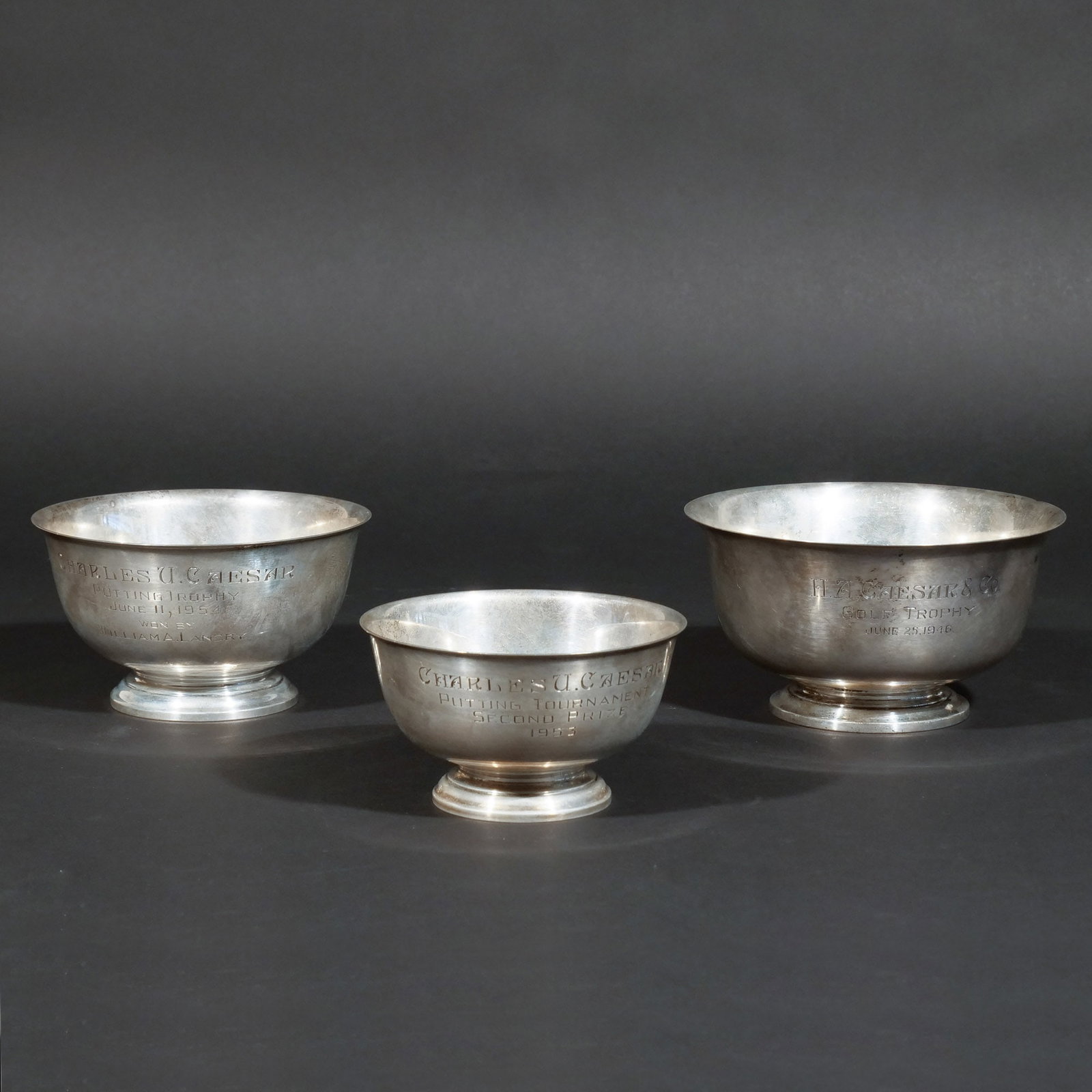 (3pc) STERLING SILVER REVERE BOWLS: Including two by Gorham and one by Redlich and Company, all engraved as golf trophies, 26 ozt total weight h. 3-1/2 dia. 6-1/2 in. (largest) Provenance: Descent through the consignor's family [In