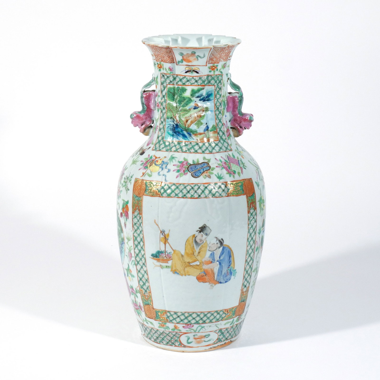 UNUSUAL CHINESE EXPORT FAMILLE ROSE 'BAG' VASE: 19th century, a porcelain 'bag' vase of an unusual baluster shape with folds at the neck to simulate a cloth bag, decorated in famille rose enamels with rectangular panels on either side showing figur