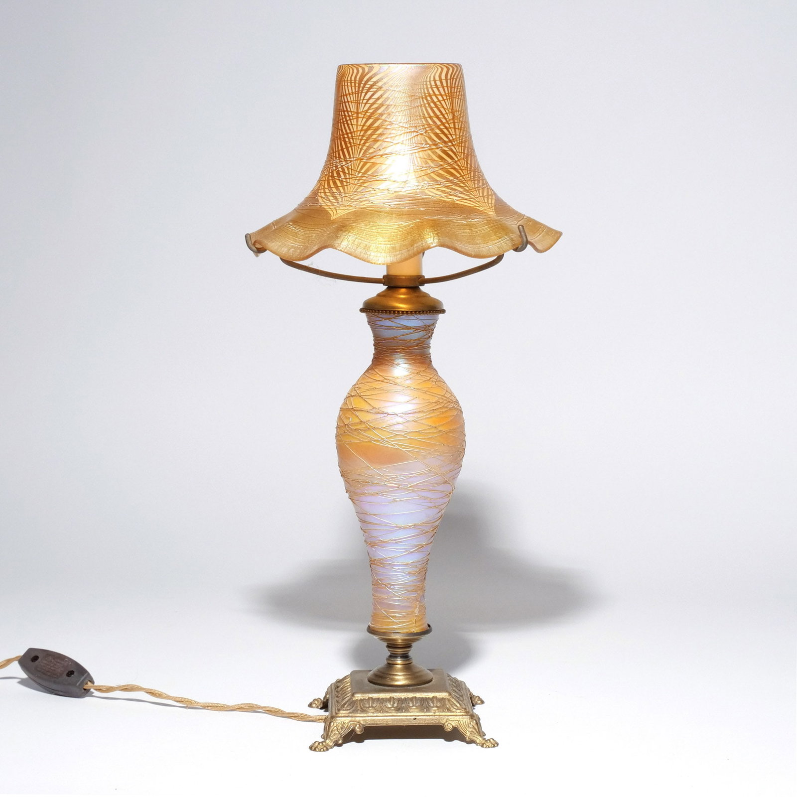 (Attrib.) DURAND ART GLASS BOUDOIR LAMP: Early 20th century, having pulled feather shade with threaded glass, unsigned h. 16 w. 7-1/2 in. Provenance: Descent through a prominent Greenwich, CT doctor's estate