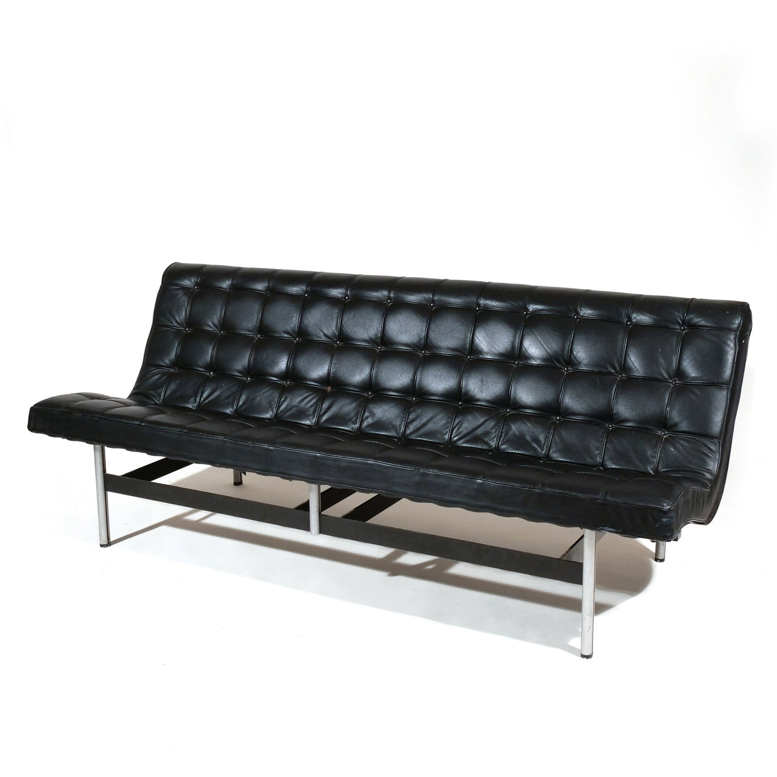KATAVOLOS, LITTELL, AND KELLEY 'NEW YORK' SOFA: for Laverne International, chrome-plated steel and leather, 1952 / c. 1960-70s h. 29 w. 70 d. 27 in. Provenance: The estate of Richard and Jean M. Bergstresser, owner of the Laurence McGuire House,