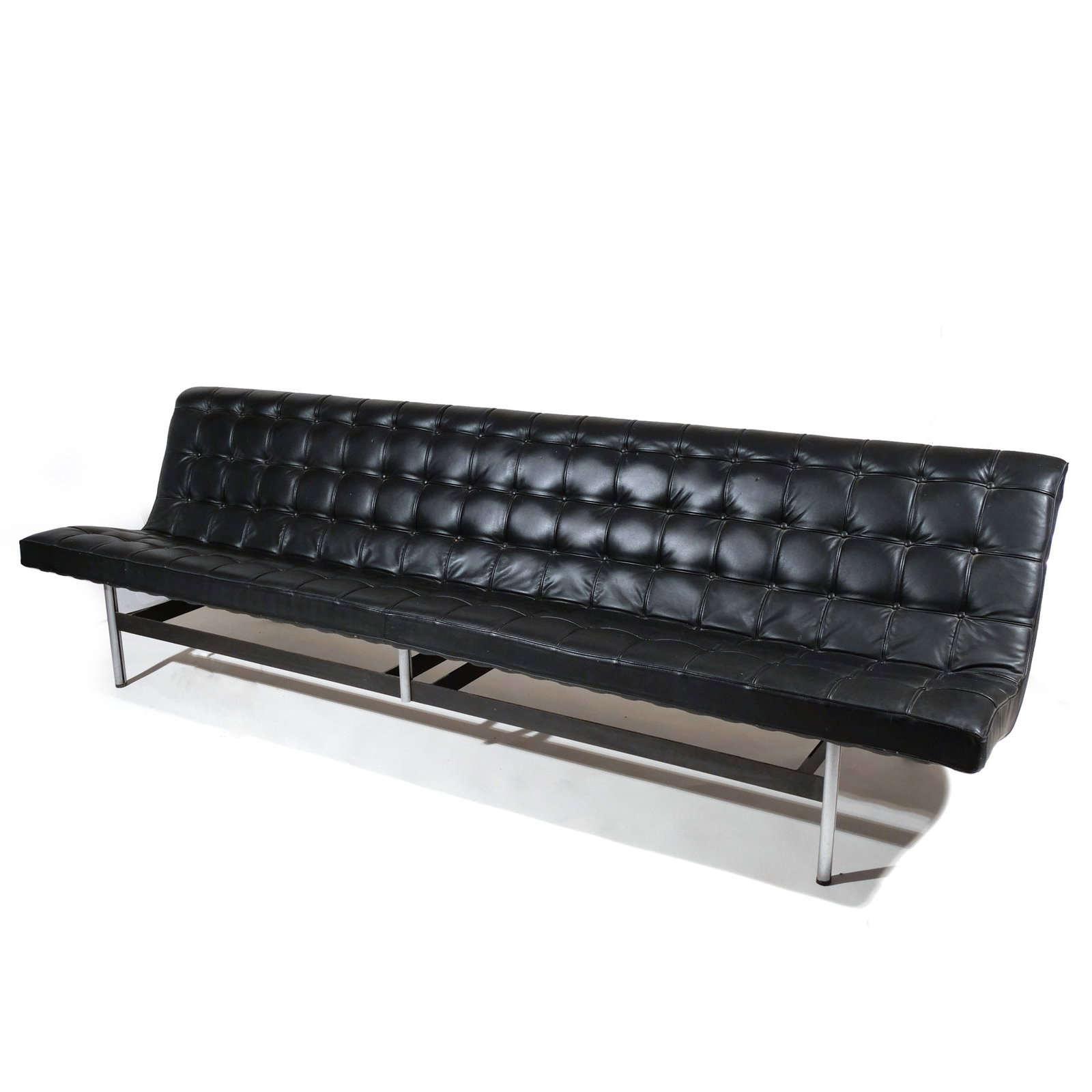 KATAVOLOS, LITTELL, & KELLEY 'NEW YORK' LARGE SOFA: for Laverne International, chrome-plated steel and leather, 1952 / c. 1960-70s h. 29 w. 98 d. 27 in. Provenance: The estate of Richard and Jean M. Bergstresser, owner of the Laurence McGuire House,
