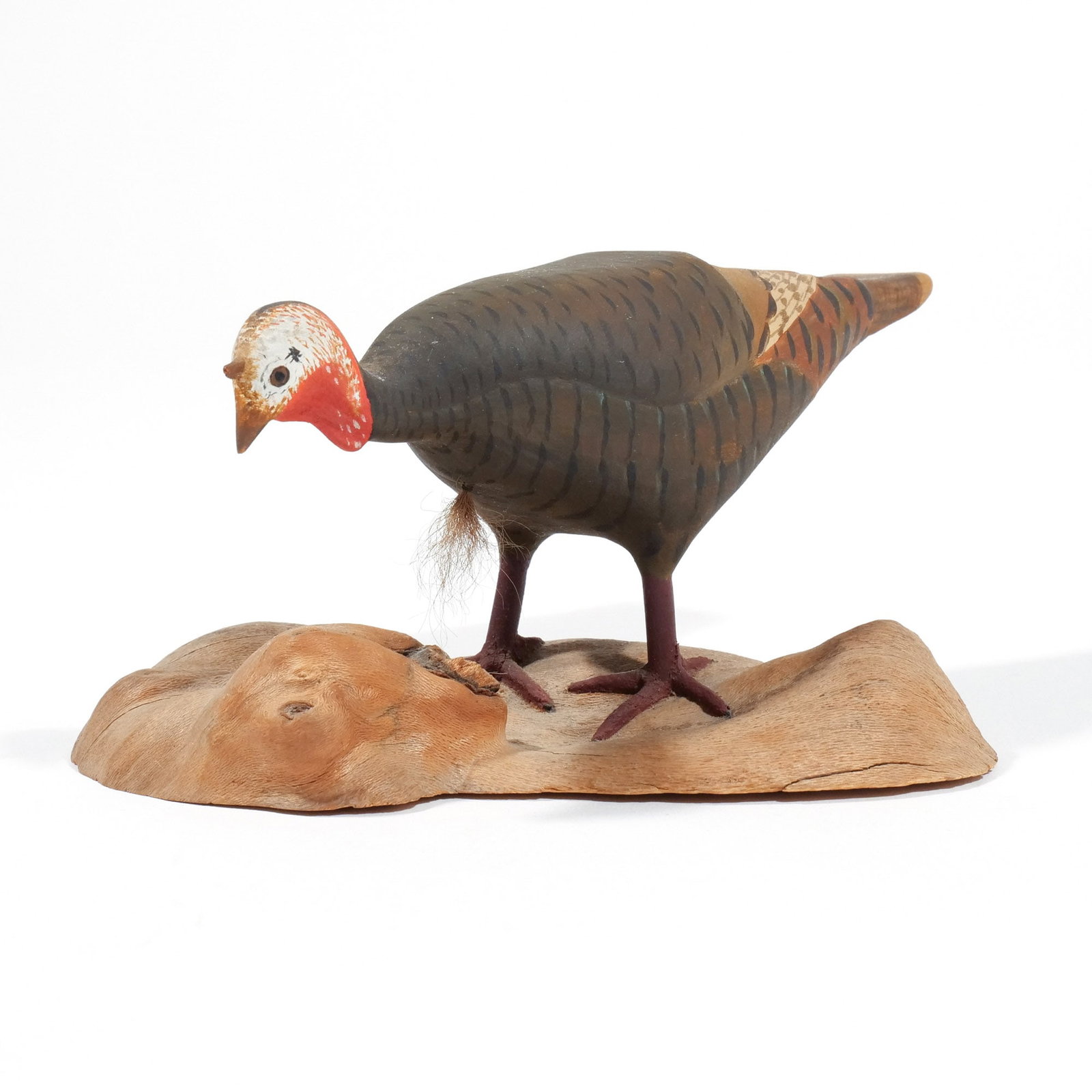 HAROLD GIBBS (1886-1970) TURKEY: Carved miniature, with applied horse hair, mounted on a driftwood base, signed 'H. Gibbs' on underside h. 3 w. 6 d. 3-1/2 in. (overall) Provenance: Descended through the estate of U.S. Ambassador Jame