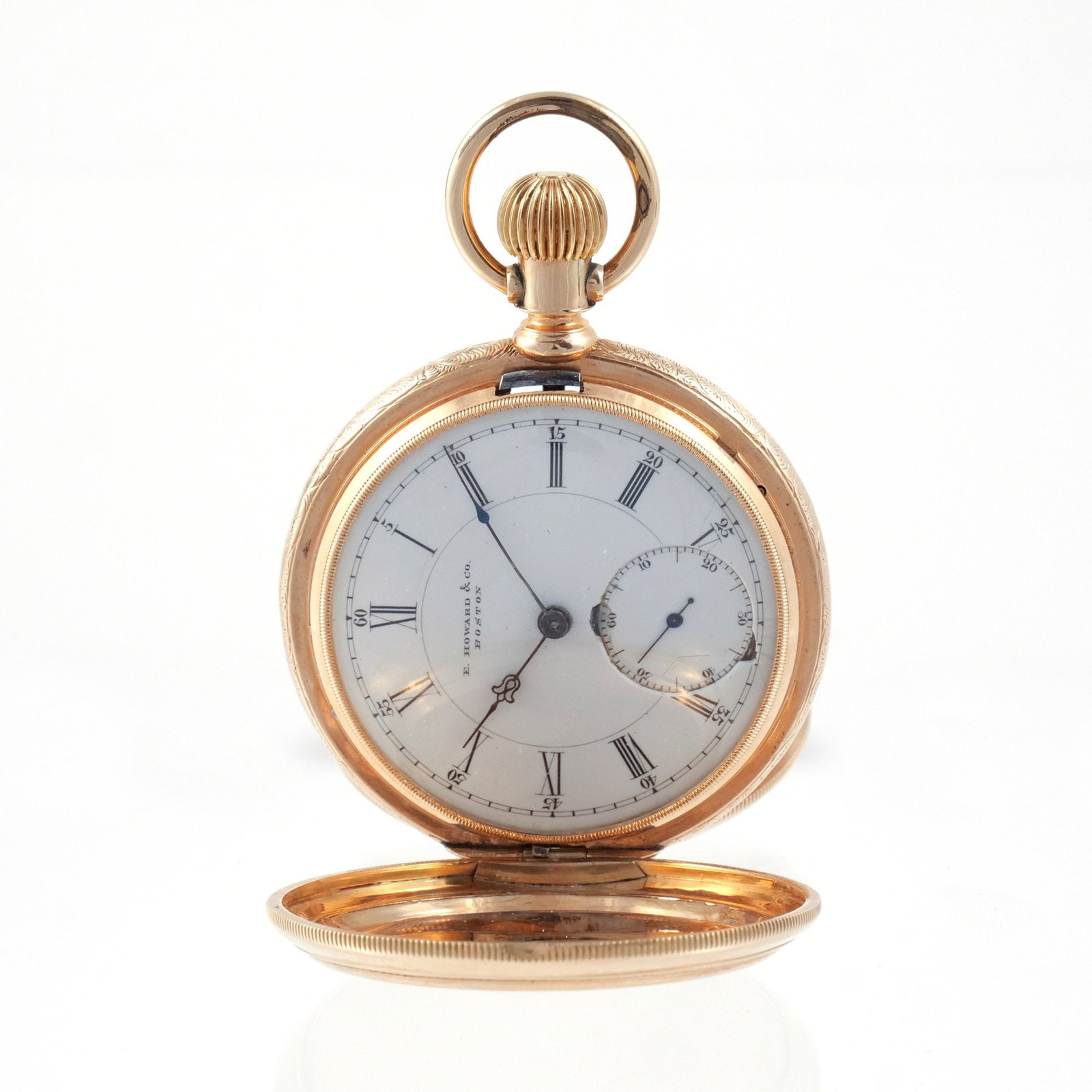 E. HOWARD & CO. 14K GOLD HUNTER'S POCKET WATCH: c. 1860s/70s, with engine turned case and engraved filigree frame; interior case stamped '14K / Warranted / U.S. Assay' and numbered; movement signed 'E. Howard & Co. / Boston' and numbered '58652'; 5