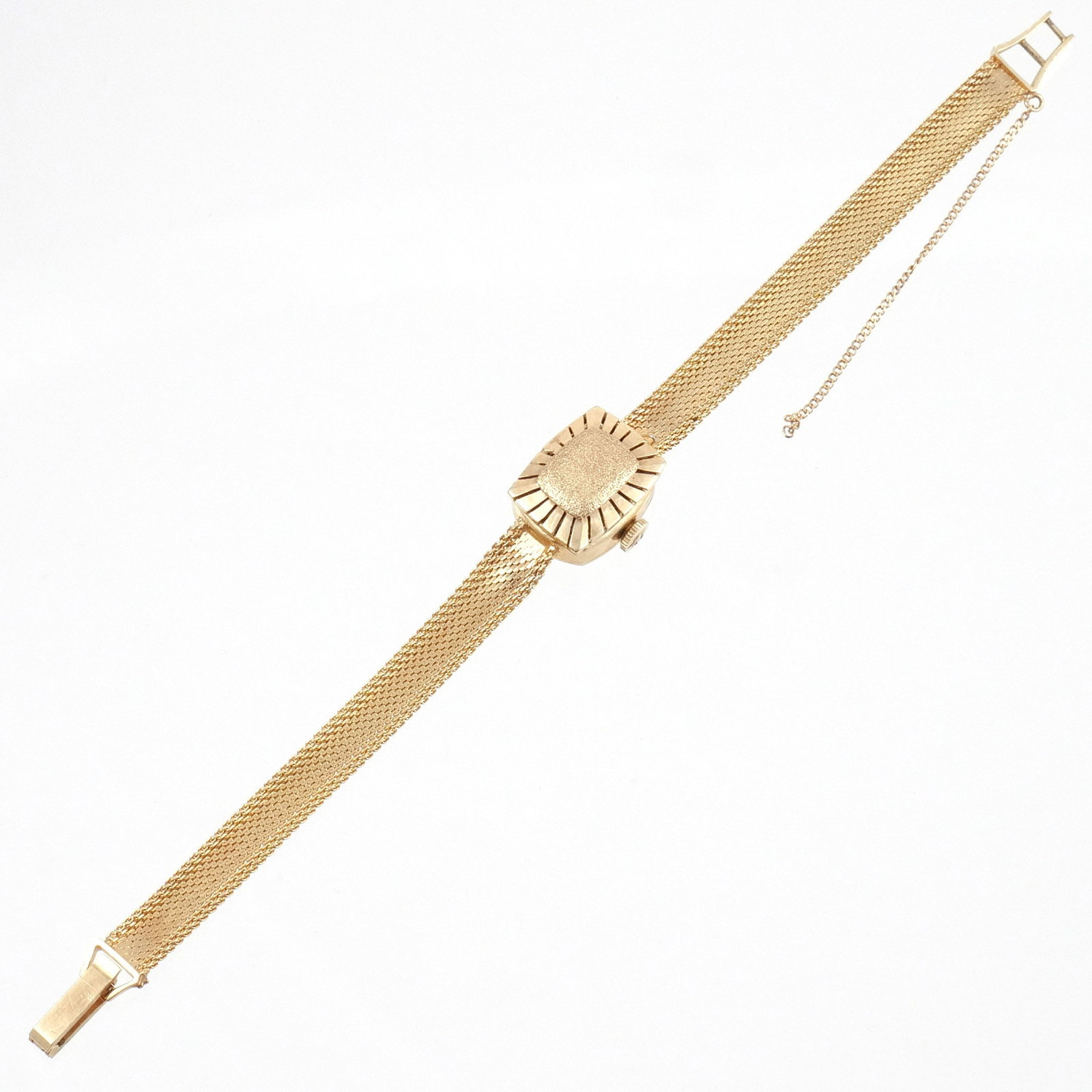 14K GOLD TISSOT LADIES BRACELET WATCH: with textured and incised gold hunter's case, case approx. 17 x 12 mm, signed 'Tissot' and marked '14K Gold', 17-jewel Swiss movement TA2551 signed and numbered, overall l. 6-1/2 in., 17.9 g total wei