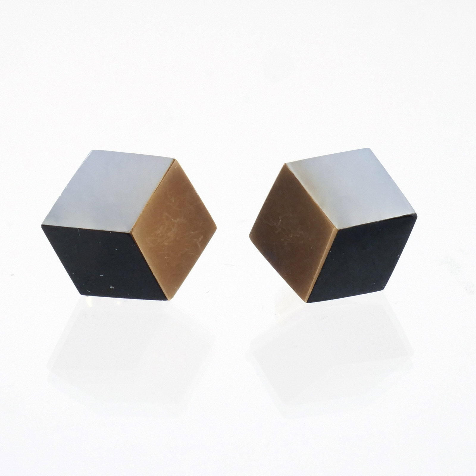 PAIR of ANGELA CUMMINGS for TIFFANY CUBE EARRINGS: Each stud a 3-sided 'illusion' cube comprised of 18K gold, onyx, and mother-of-pearl sides, marked '18k' and signed 'Cummings / T & Co.', 3.7 g total weight h. 1/2 in. Provenance: Descended through th