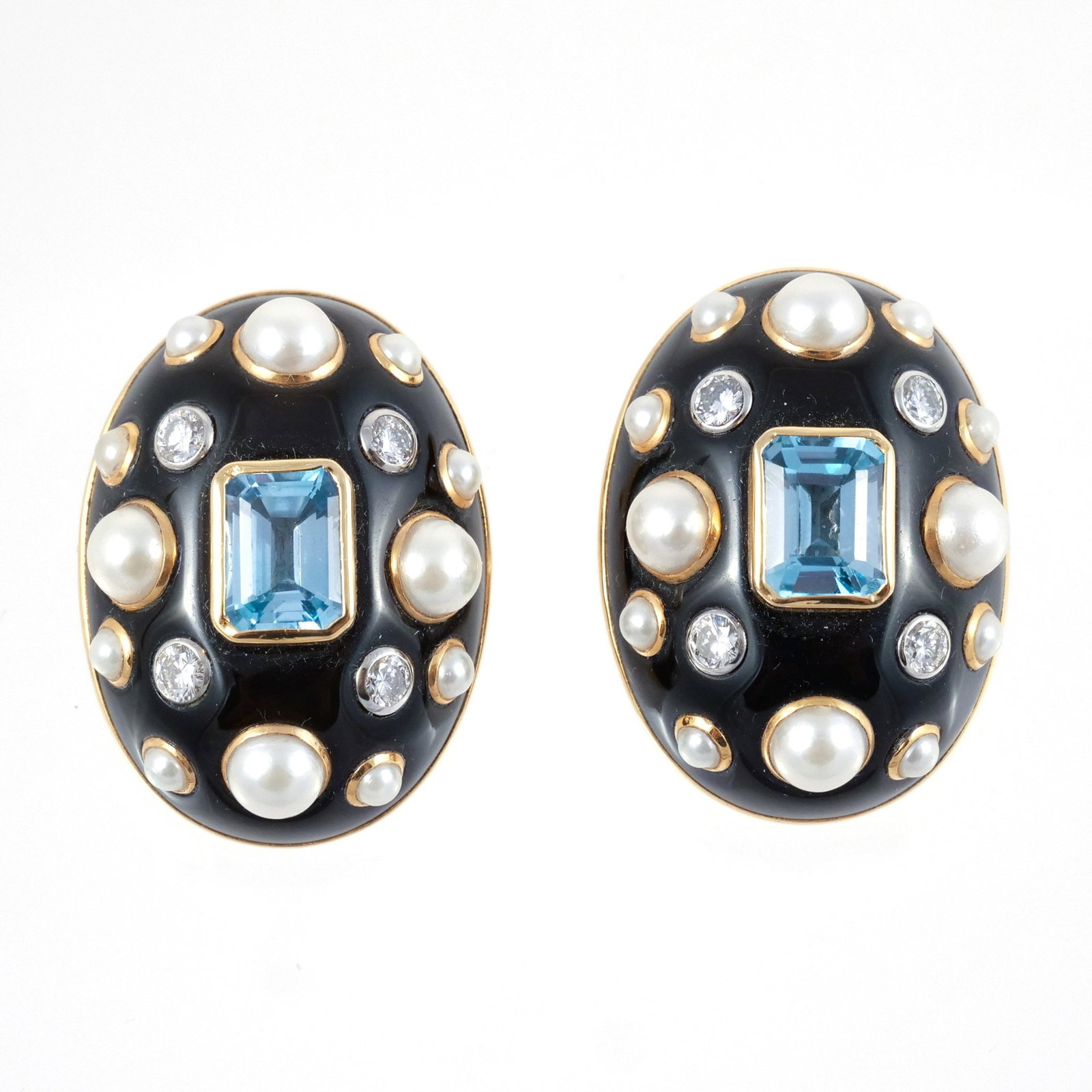 PAIR VERDURA BLACK JADE, PEARL & DIAMOND EAR CLIPS: Set in 18k gold, designed as ovoids of polished black jade centered with bezel-set emerald-cut aquamarines and accented by bezel-set pearls and diamonds, approx. 2 cts total aquamarines, approx. 1.2 c
