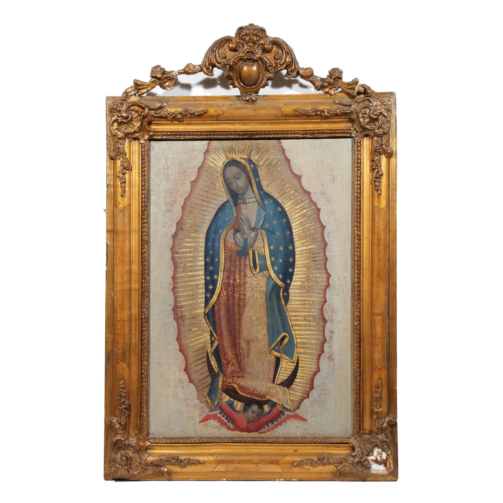 MEXICAN COLONIAL SCHOOL, 18th/19th century: Apparition of the Virgin of Guadalupe Oil on canvas laid on board h. 17-1/4 w. 12 in. No apparent signature, in an early 20th century gilt composition frame overall: 25-1/4 x 16-1/4 in. (framed) Prove