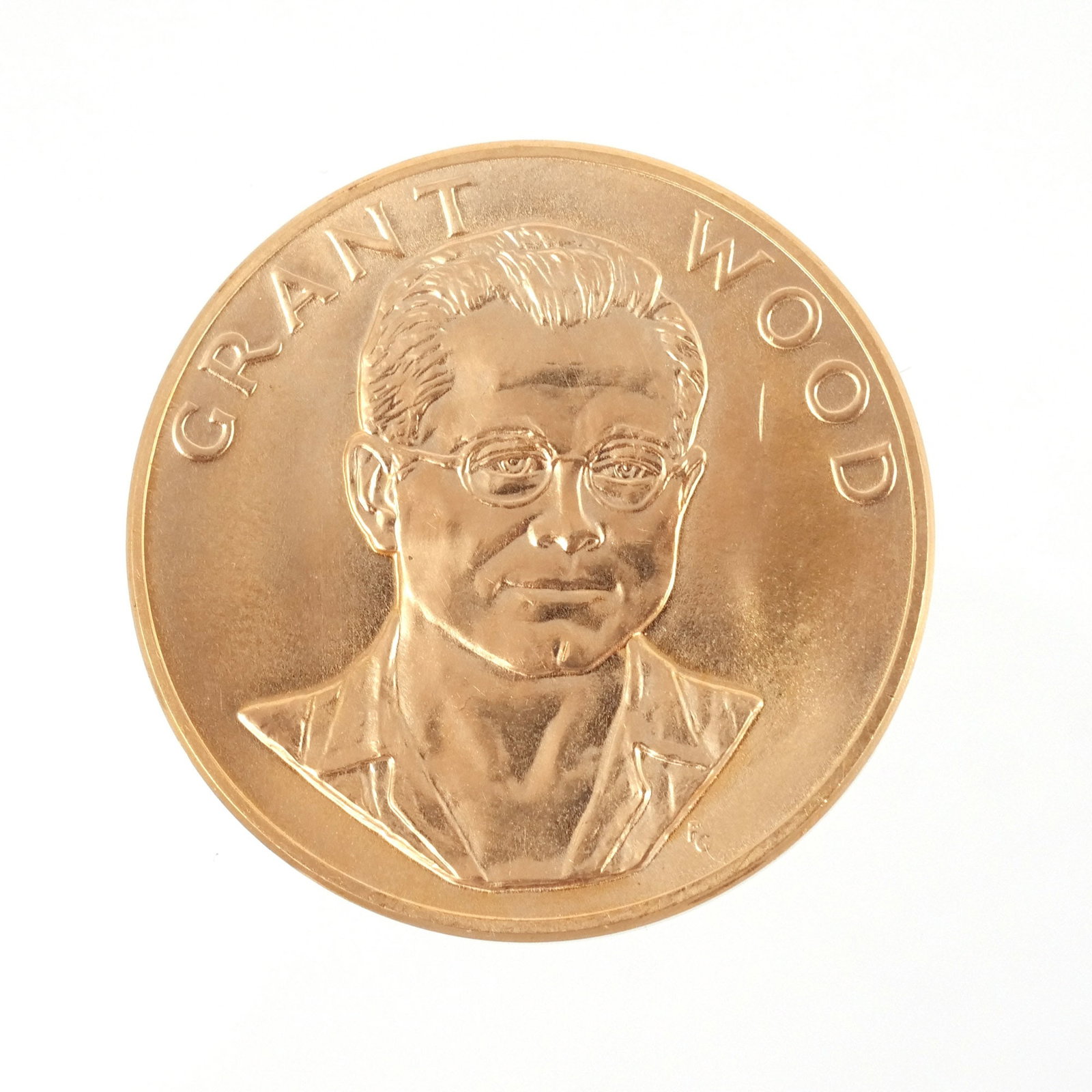 1980 GRANT WOOD COMMEMORATIVE GOLD COIN: From the American Arts Commemorative Series Provenance: Descended through the estate of U.S. Ambassador James C. H. Bonbright, Washington, DC
