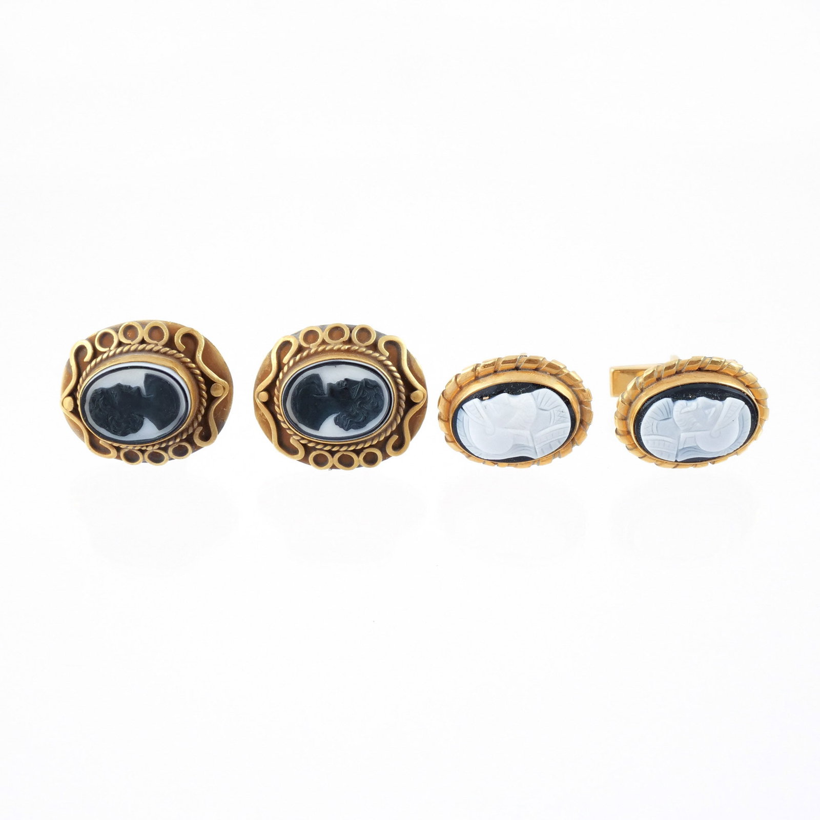 (4pc) TWO PAIRS 14K GOLD & CAMEO CUFFLINKS: Including a pair with Roman soldiers and a pair with fancy surround, 29.6 g total weight h. 1 w. 3/4 in. (largest) Provenance: The estate of a noted architect and bibliophile, Rye, NY