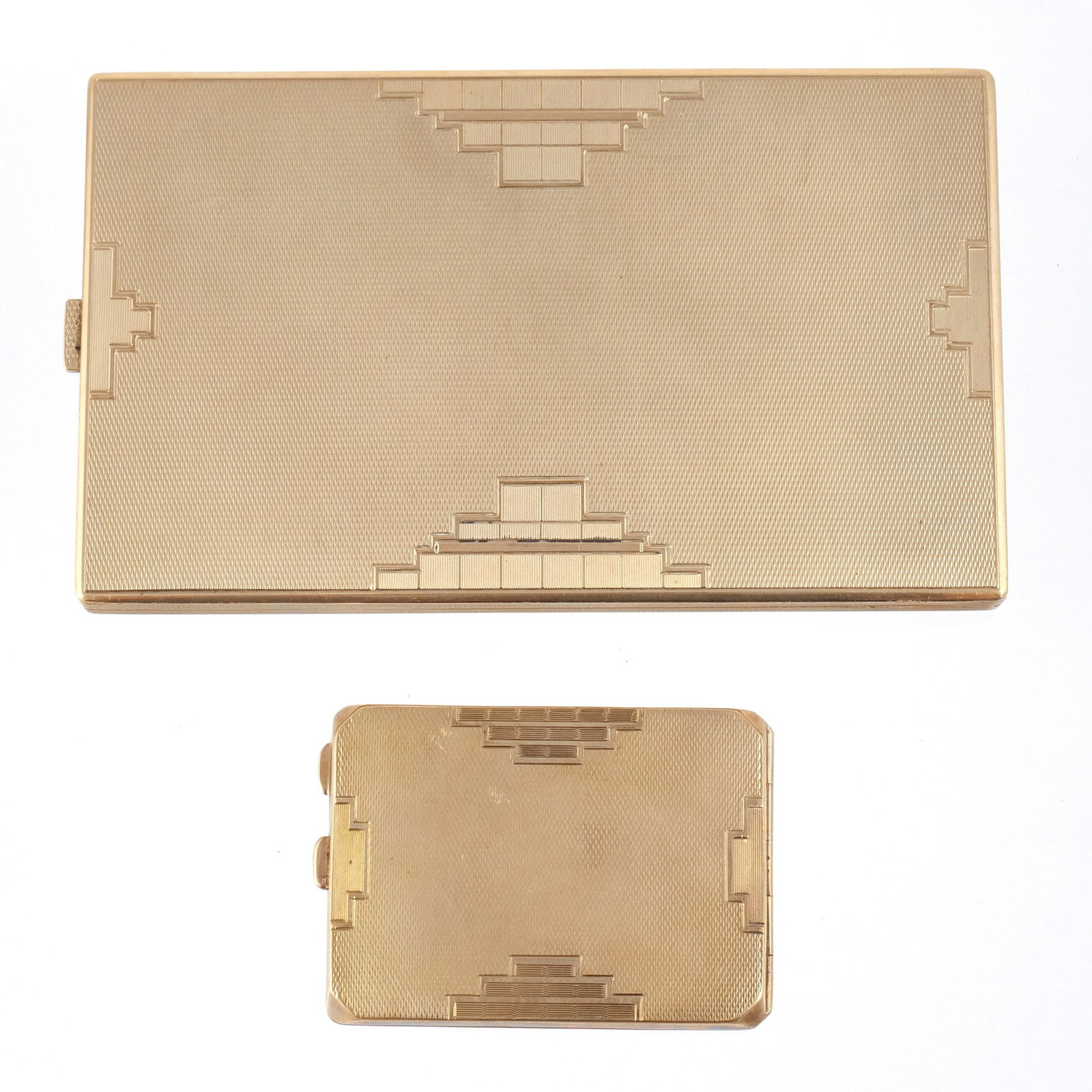 (2pc) 9K GOLD CIGARETTE AND MATCH CASES: Circa 1930s, art deco style of textured gold with rounded corners, Marked 'The 'Belvoir' / 9 / .375' with maker's mark 'B&S' and Birmingham assay mark, 221.8 g total weight h. 5/16 w. 5-3/8 d. 3-1/8 i