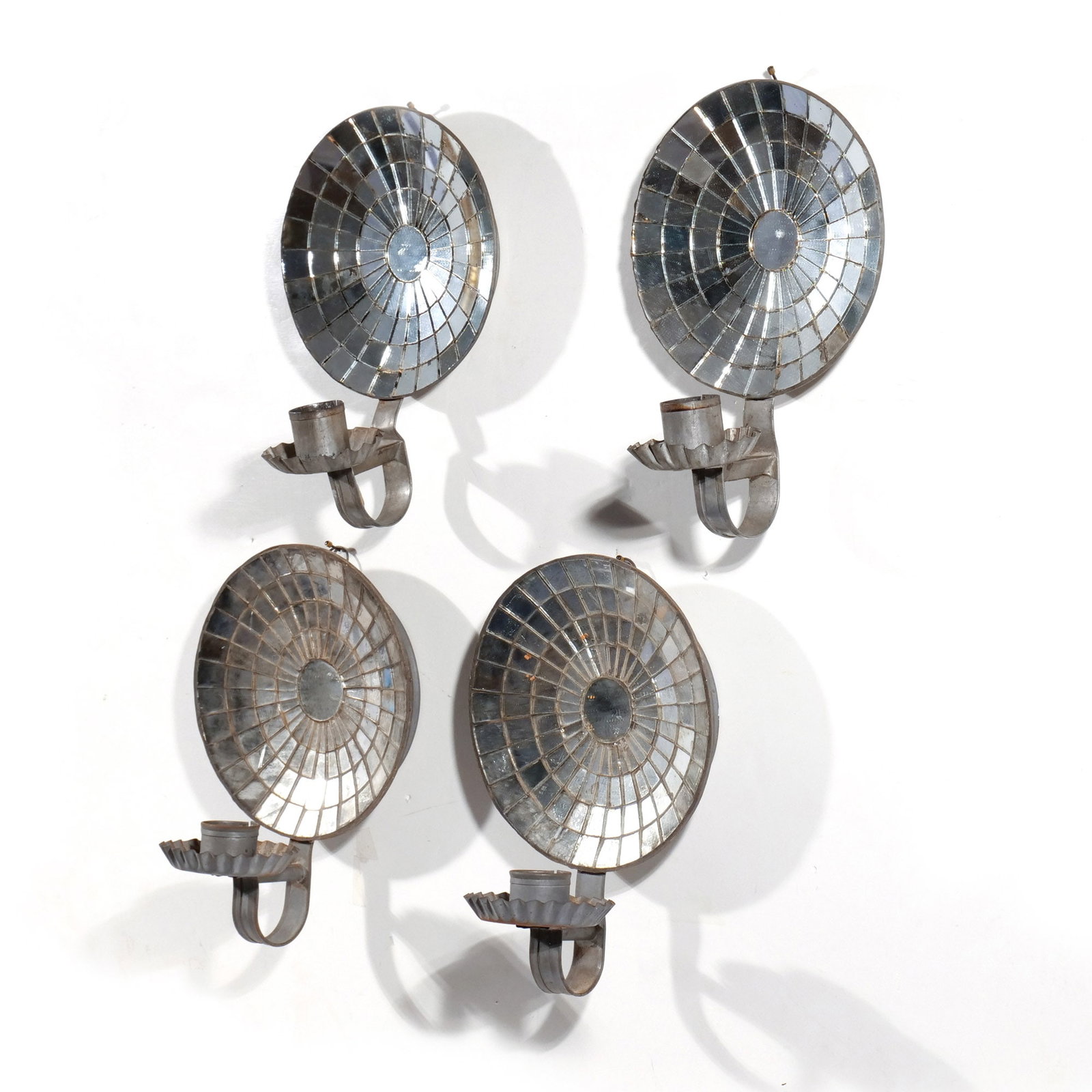 (4pc) TWO PAIRS of MIRRORED REFLECTOR SCONCES: Late 19th / early 20th century, tin and glass h. 10-1/4 w. 7-1/2 d. 6-1/2 in. Provenance: Private collection, Bernardsville, NJ [In Situ Item] This item will not be on display in our saleroom during
