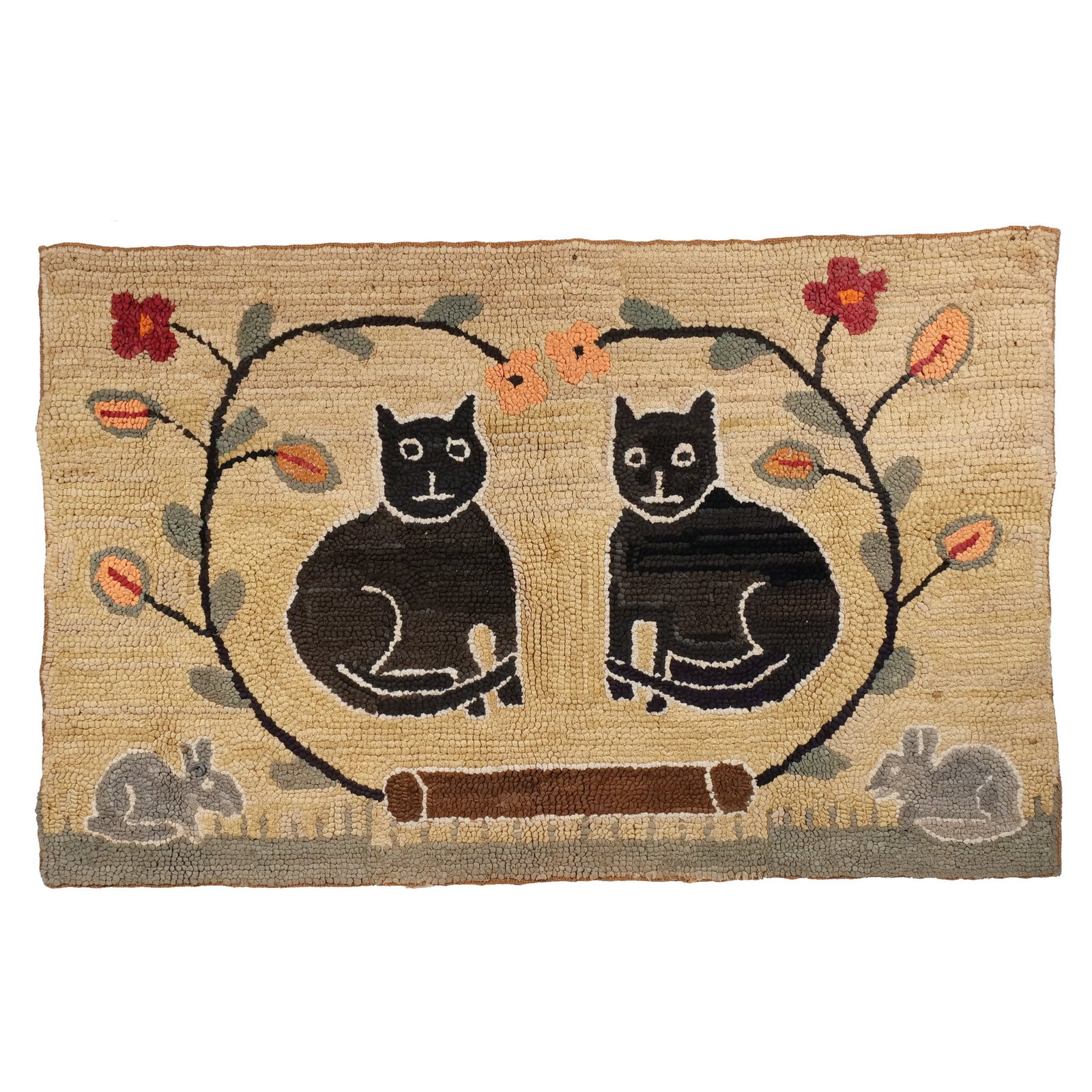 MENNONITE HOOKED RUG: 19th century, with two black cats flanked by floral motifs and small bunnies at the bottom corners h. 25 w. 39 in. Provenance: Private collection, Bernardsville, NJ