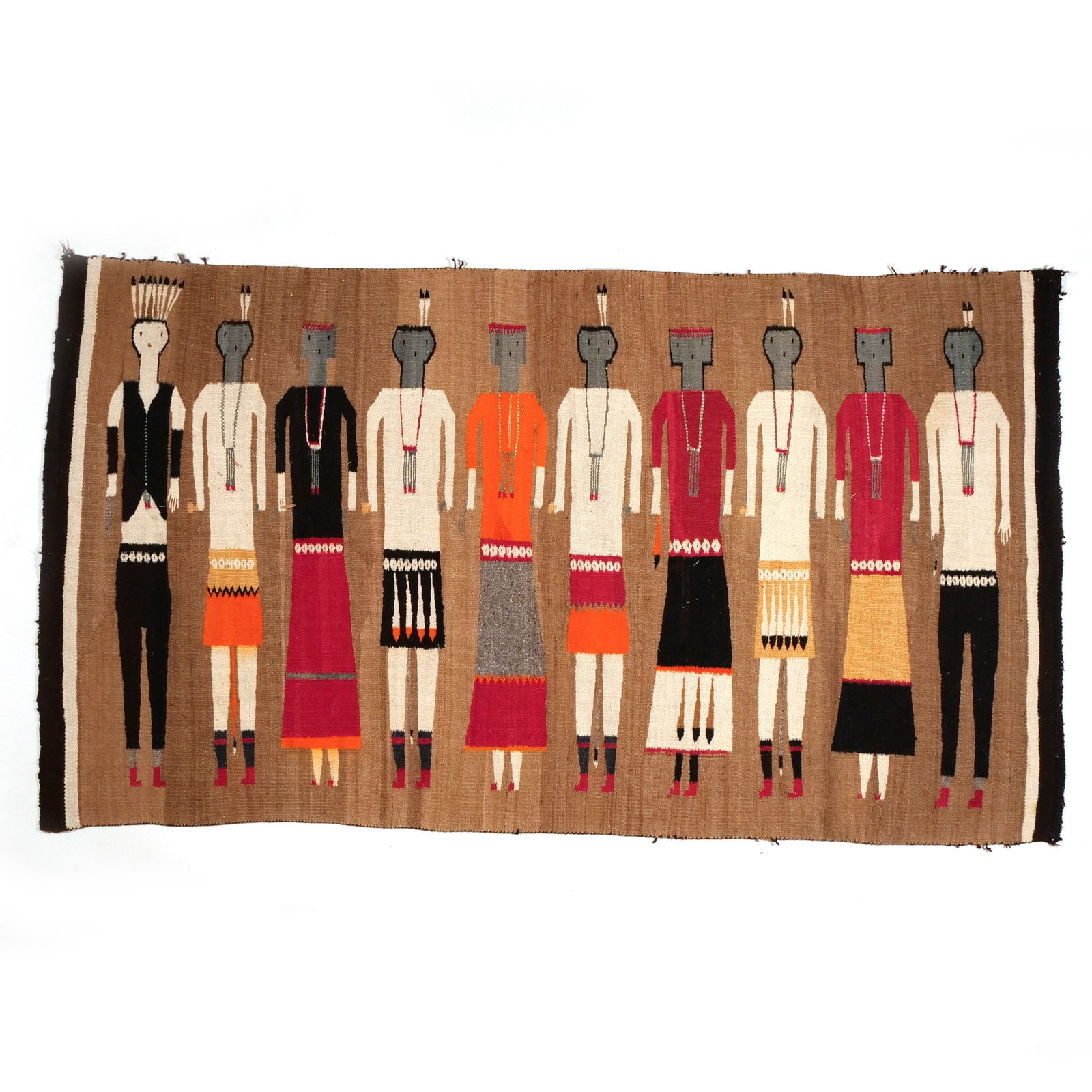 NAVAJO YEI RUG: c. 1930s, showing 10 Yei figures wearing feathers, necklace, and concha belt on brown field h. 5 ft. 11 in. w. 3 ft. 3 in. Provenance: Descent through a prominent Greenwich, CT family [In Situ Item]