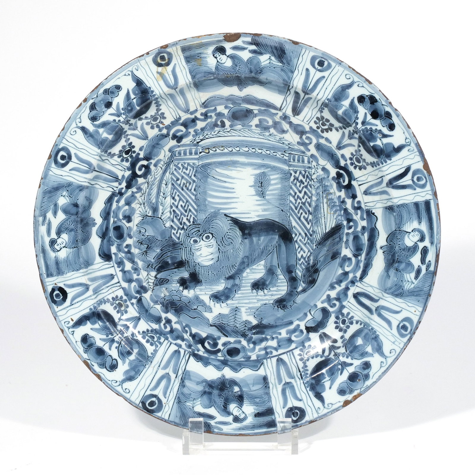 DUTCH DELFT 'LION OF JUDAH' CHARGER: 18th century, blue and white earthenware charger in the Kraak style with Lion of standing before a Torah h. 2-1/8 dia. 13-5/8 in. Provenance: The estate of a noted architect and bibliophile, Rye, NY