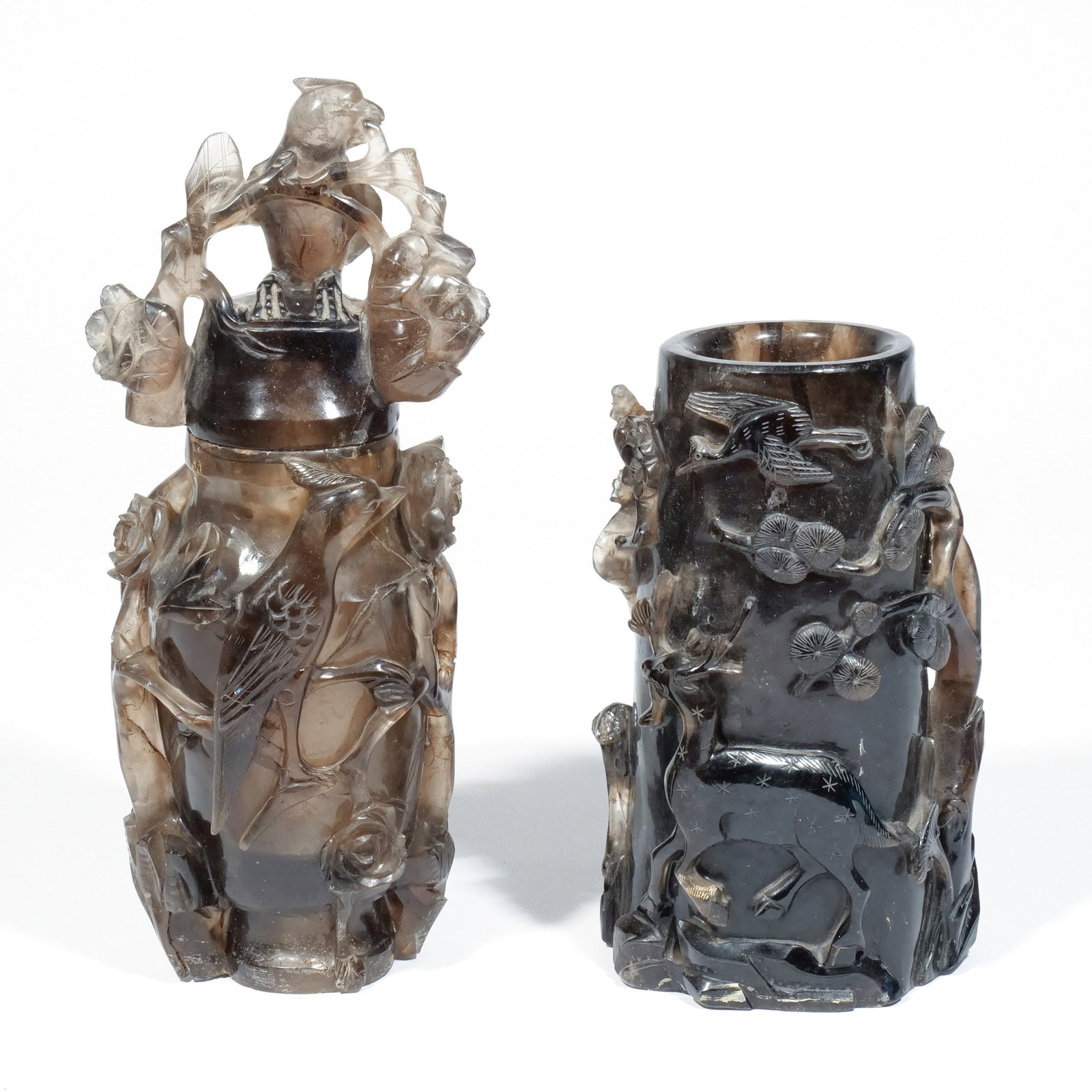 (2pc) CHINESE SMOKY QUARTZ CARVINGS: Late Qing / early 20th century, including a vase and cover with bird and flower carving; and a brush pot with deer, pine, and bird carving; both mounted as lamps h. 27 w. 5 d. 4-1/2 in. (largest) Prov
