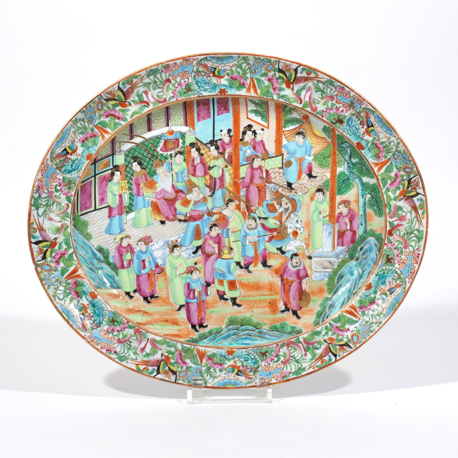 CHINESE EXPORT FAMILLE ROSE PORCELAIN PLATTER: 19th century, in the rose medallion pattern, depicting a figural scene with nobles and attendants h. 2 w. 18-7/8 d. 15-3/4 in. Provenance: The estate of noted artist and author Edward Giobbi (1926-202