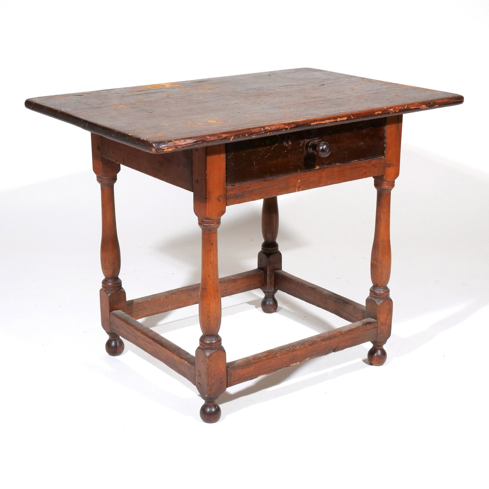 SMALL MAPLE & PINE TAVERN TABLE: American, 18th century, having an over hanging top over full-width drawer, resting on block and turned legs attached to box stretcher h. 22-1/4 w. 28-1/2 d. 20 in. Provenance: Private collection,