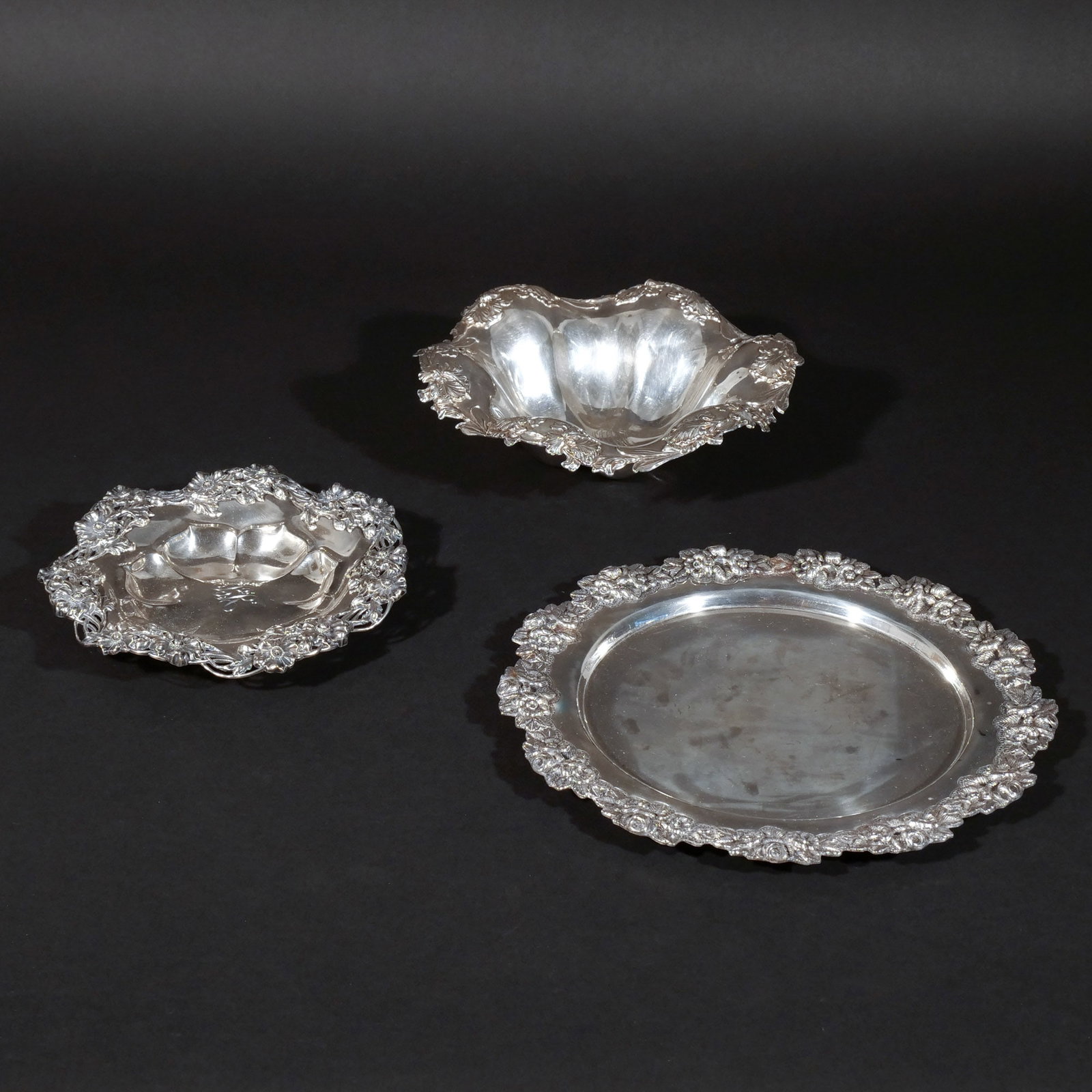 (3pc) STERLING SILVER SERVEWARE: Including an Alvin Co. bowl, a Hansel Sloan & Co. bowl, and a tray, all marked 'Sterling'; 28 ozt total weight dia. 10-1/4 in. (largest) Provenance: Private collection, Mount Kisco, NY [In Situ Item] 
