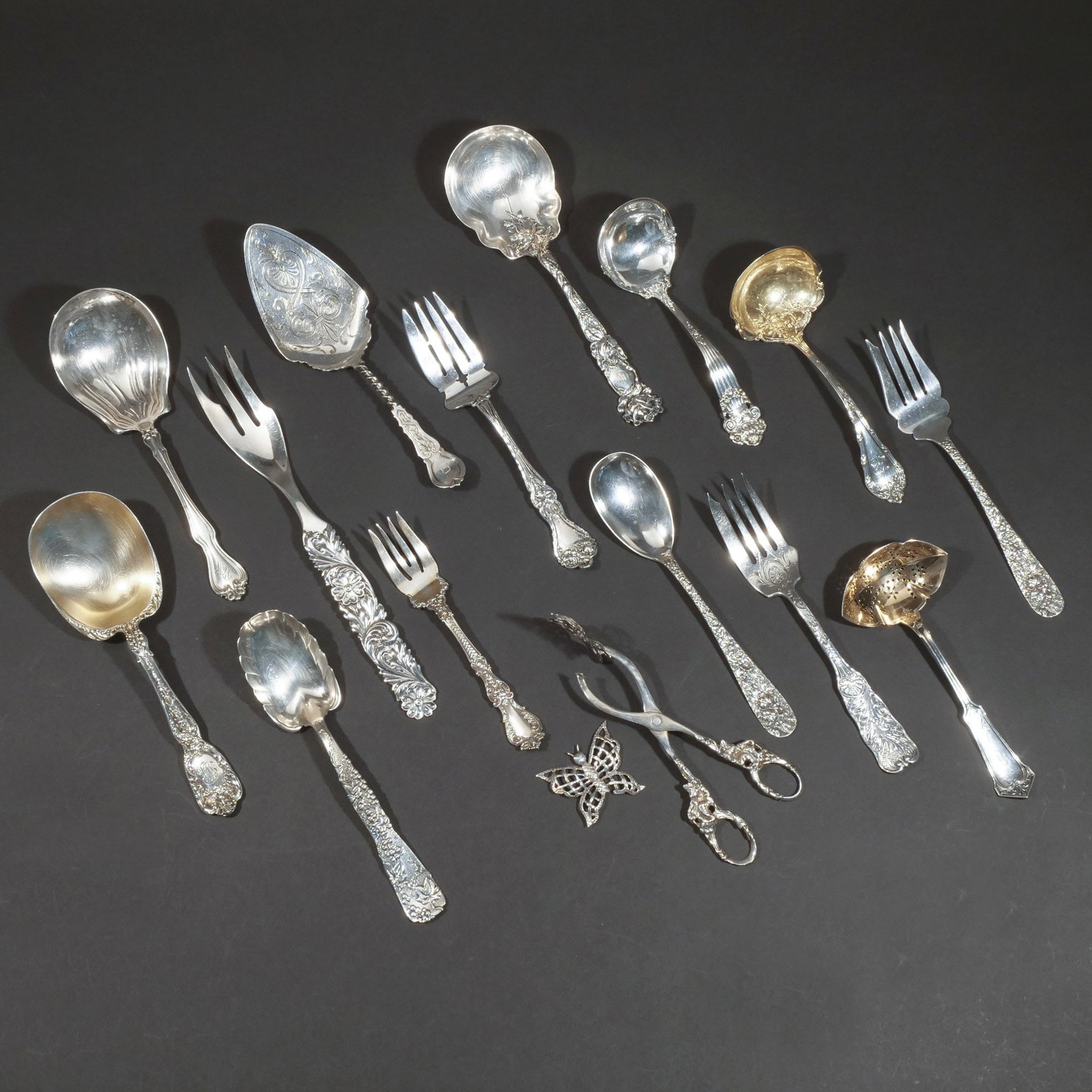 (15pc) MISC. STERLING SILVER SERVING PIECES: Including an Alvin Co. serving fork, a Gorham serving fork, a George W. Shiebler Co. meat fork, a Spaulding & Co. small serving fork, a matching Stieff serving spoon and fork, an Alvin & Co. serving s