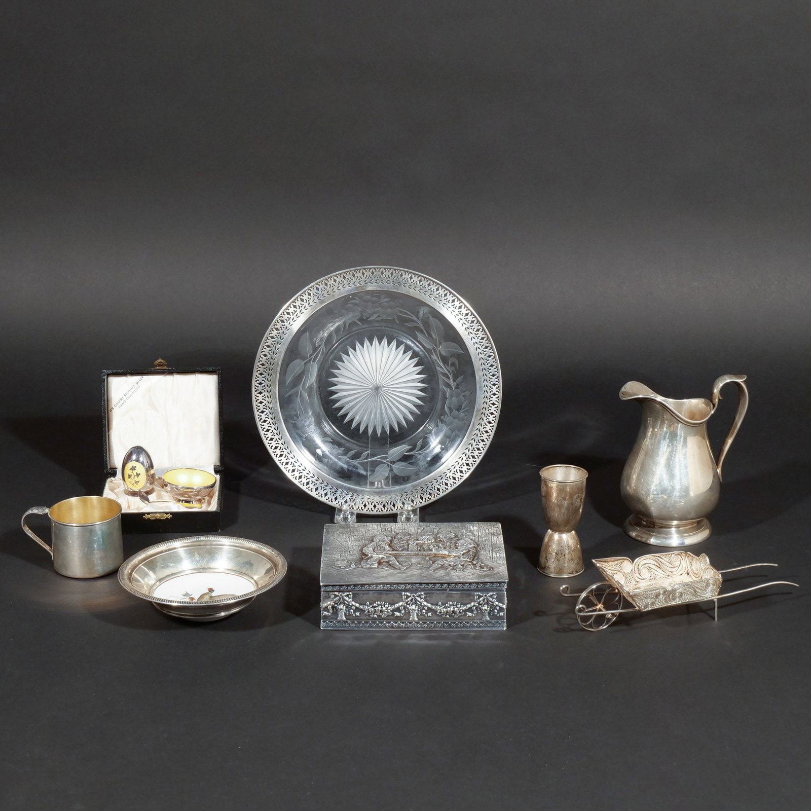(9pc) MISC. STERLING SILVER & OTHER: Including a Shreve, Treat and Eacret sterling silver creamer with engraved crane, 1 sterling birthday / child's cup, 1 Gorham sterling measure with Mixing Guide booklet, 1 filigree silver wheelbarrow 